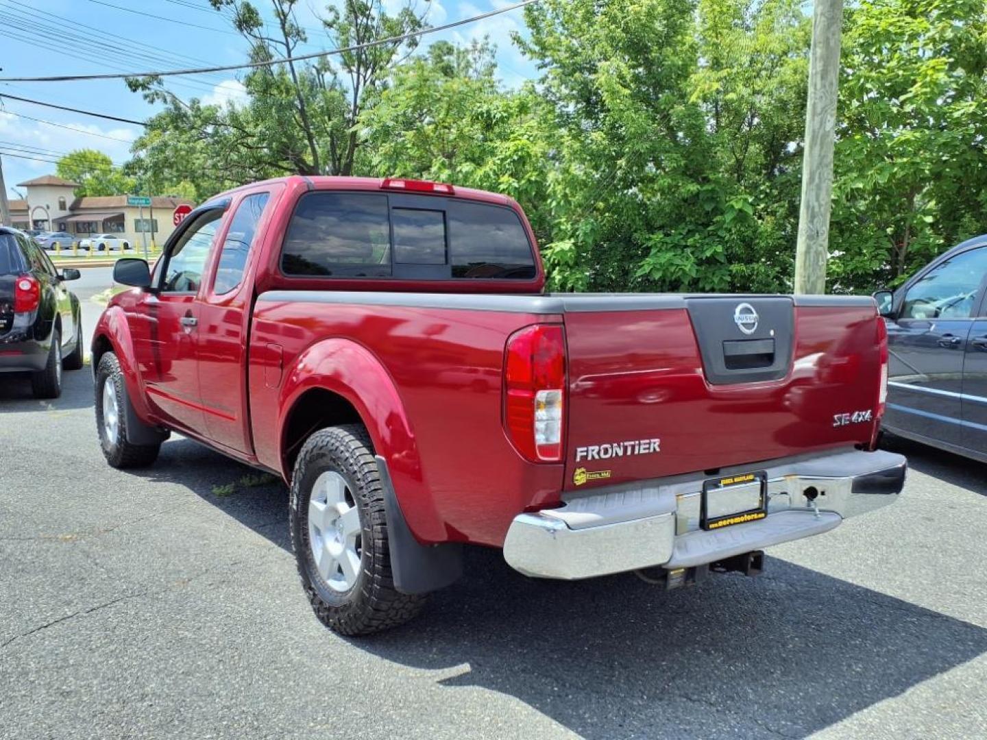 2008 Red Alert Nissan Frontier SE V6 (1N6AD06W08C) with an 4.0L 4.0L V6 261hp 281ft. lbs. Fuel Injected engine, 5-Speed Automatic transmission, located at 50 Eastern Blvd., Essex, MD, 21221, (410) 686-3444, 39.304367, -76.484947 - Photo#2