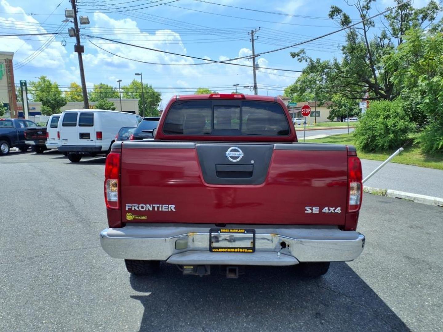 2008 Red Alert Nissan Frontier SE V6 (1N6AD06W08C) with an 4.0L 4.0L V6 261hp 281ft. lbs. Fuel Injected engine, 5-Speed Automatic transmission, located at 50 Eastern Blvd., Essex, MD, 21221, (410) 686-3444, 39.304367, -76.484947 - Photo#3
