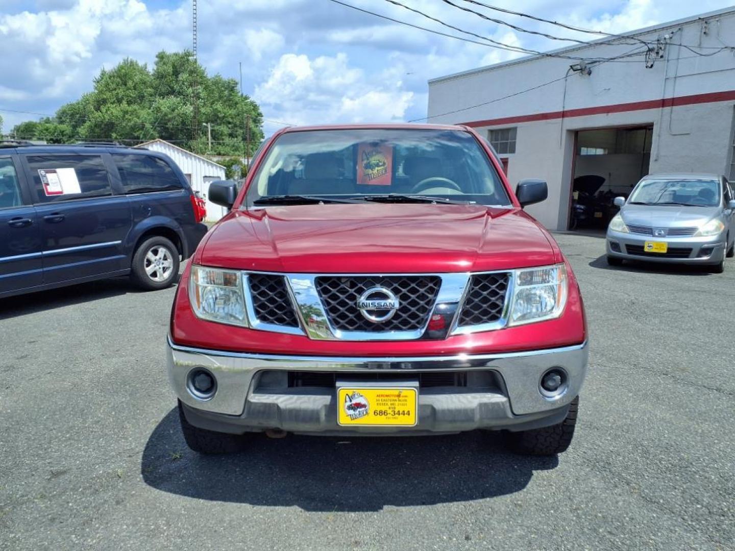 2008 Red Alert Nissan Frontier SE V6 (1N6AD06W08C) with an 4.0L 4.0L V6 261hp 281ft. lbs. Fuel Injected engine, 5-Speed Automatic transmission, located at 50 Eastern Blvd., Essex, MD, 21221, (410) 686-3444, 39.304367, -76.484947 - Photo#8