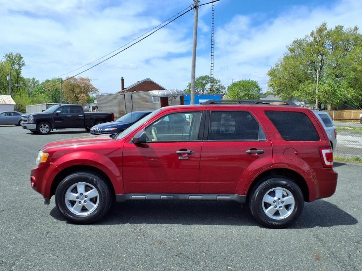 2012 Toreador Red Metallic Ford Escape XLT (1FMCU0D75CK) with an 2.5L 4 Cylinder Sequential-Port F.I. engine, Automatic transmission, located at 50 Eastern Blvd., Essex, MD, 21221, (410) 686-3444, 39.304367, -76.484947 - Photo#1