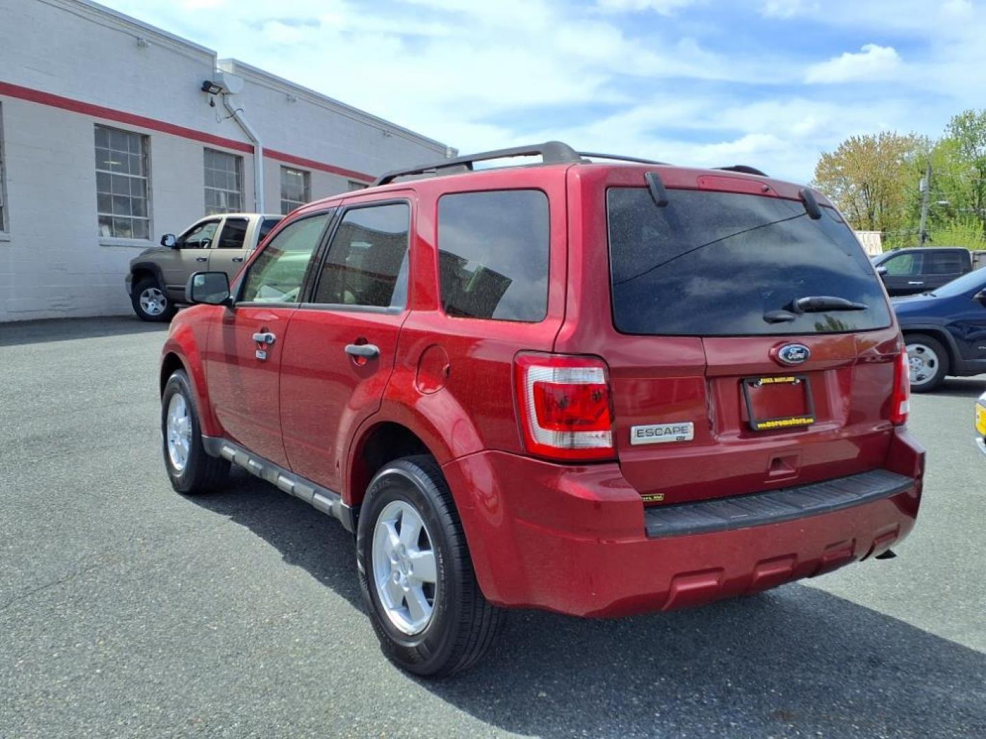 2012 Toreador Red Metallic Ford Escape XLT (1FMCU0D75CK) with an 2.5L 4 Cylinder Sequential-Port F.I. engine, Automatic transmission, located at 50 Eastern Blvd., Essex, MD, 21221, (410) 686-3444, 39.304367, -76.484947 - Photo#2