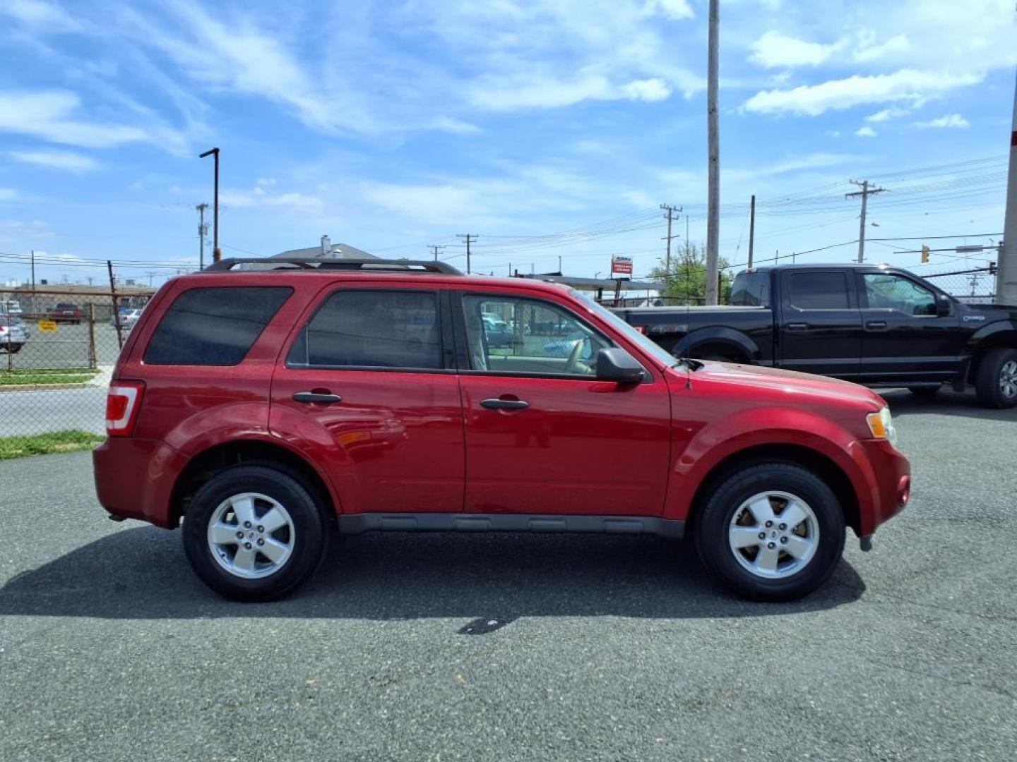 2012 Toreador Red Metallic Ford Escape XLT (1FMCU0D75CK) with an 2.5L 4 Cylinder Sequential-Port F.I. engine, Automatic transmission, located at 50 Eastern Blvd., Essex, MD, 21221, (410) 686-3444, 39.304367, -76.484947 - Photo#6