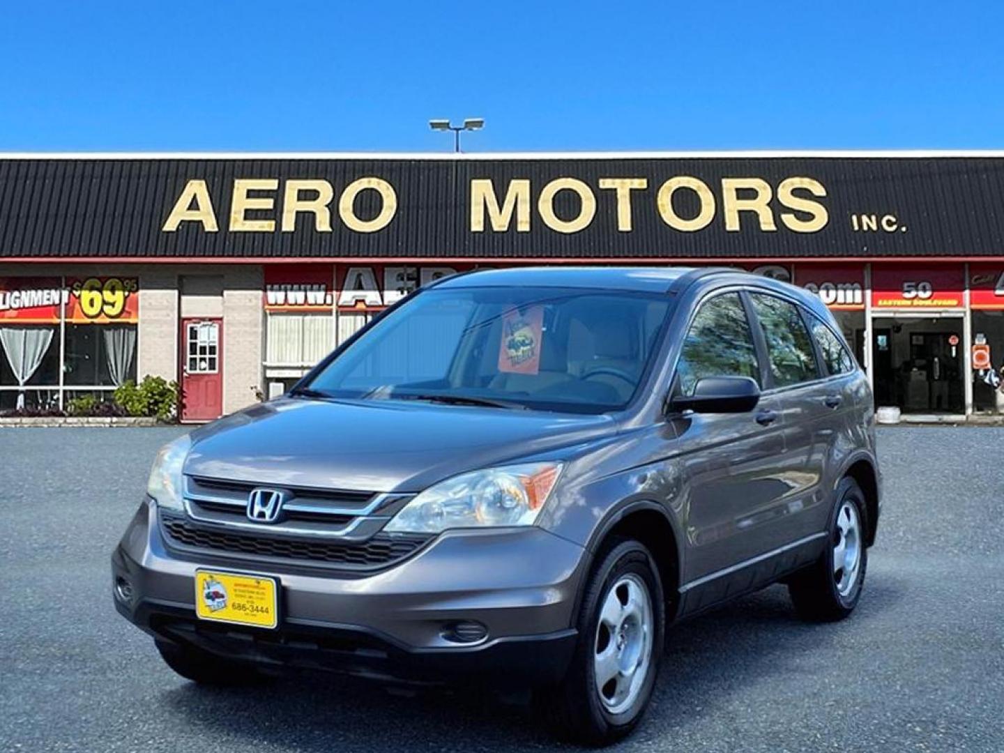 2010 Urban Titanium Metallic Honda CR-V LX (5J6RE3H30AL) with an 2.4L 4 Cylinder Sequential-Port F.I. engine, Automatic transmission, located at 50 Eastern Blvd., Essex, MD, 21221, (410) 686-3444, 39.304367, -76.484947 - Photo#0