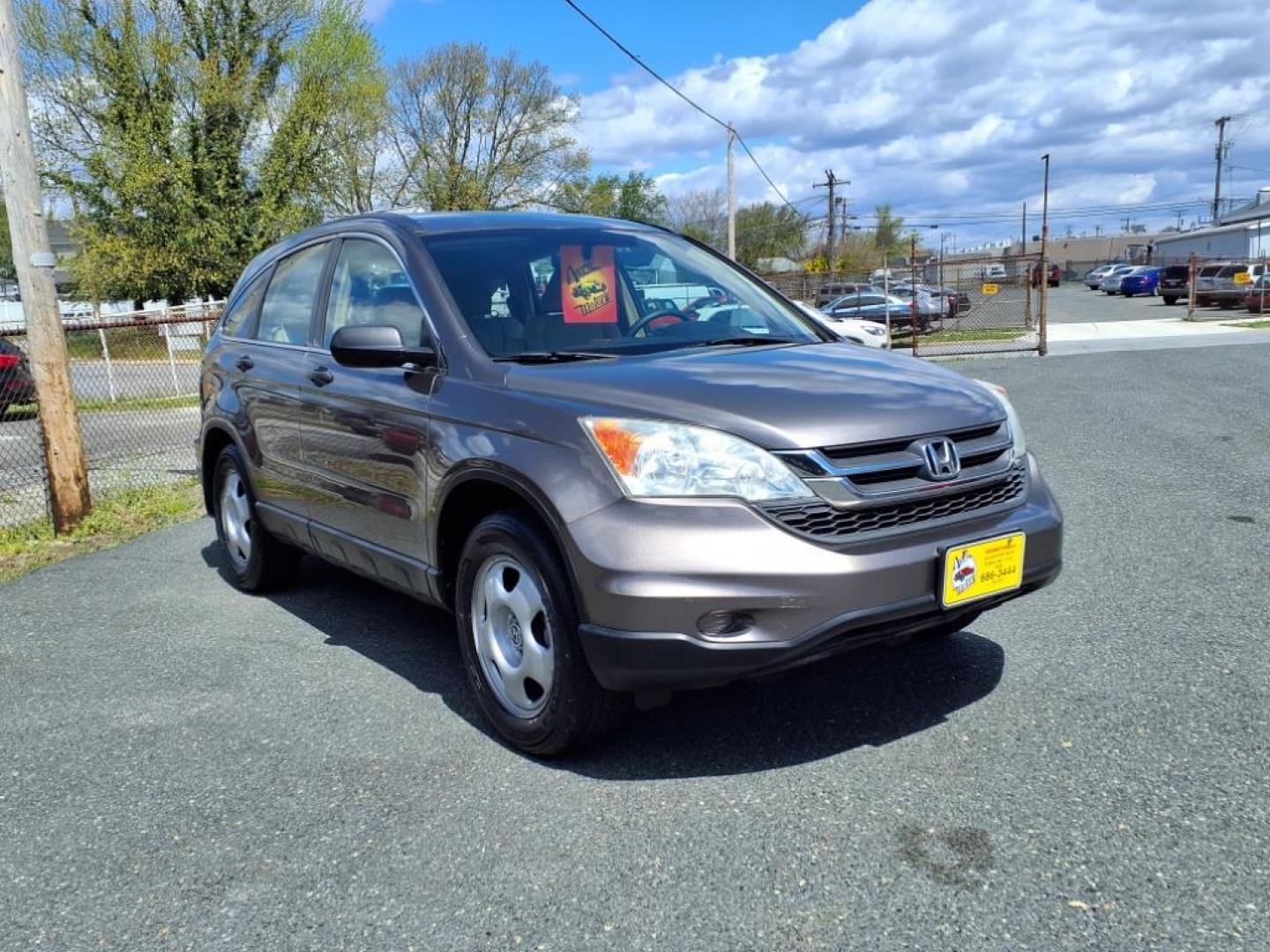 2010 Urban Titanium Metallic Honda CR-V LX (5J6RE3H30AL) with an 2.4L 4 Cylinder Sequential-Port F.I. engine, Automatic transmission, located at 50 Eastern Blvd., Essex, MD, 21221, (410) 686-3444, 39.304367, -76.484947 - Photo#7