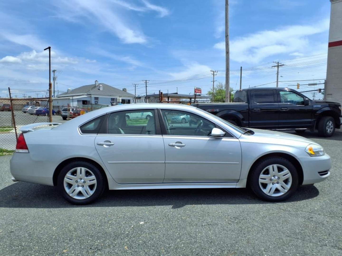 2012 Silver Ice Metallic Chevrolet Impala LT (2G1WB5E3XC1) with an 3.6L 6 Cylinder Not Specified engine, Automatic transmission, located at 50 Eastern Blvd., Essex, MD, 21221, (410) 686-3444, 39.304367, -76.484947 - Photo#5