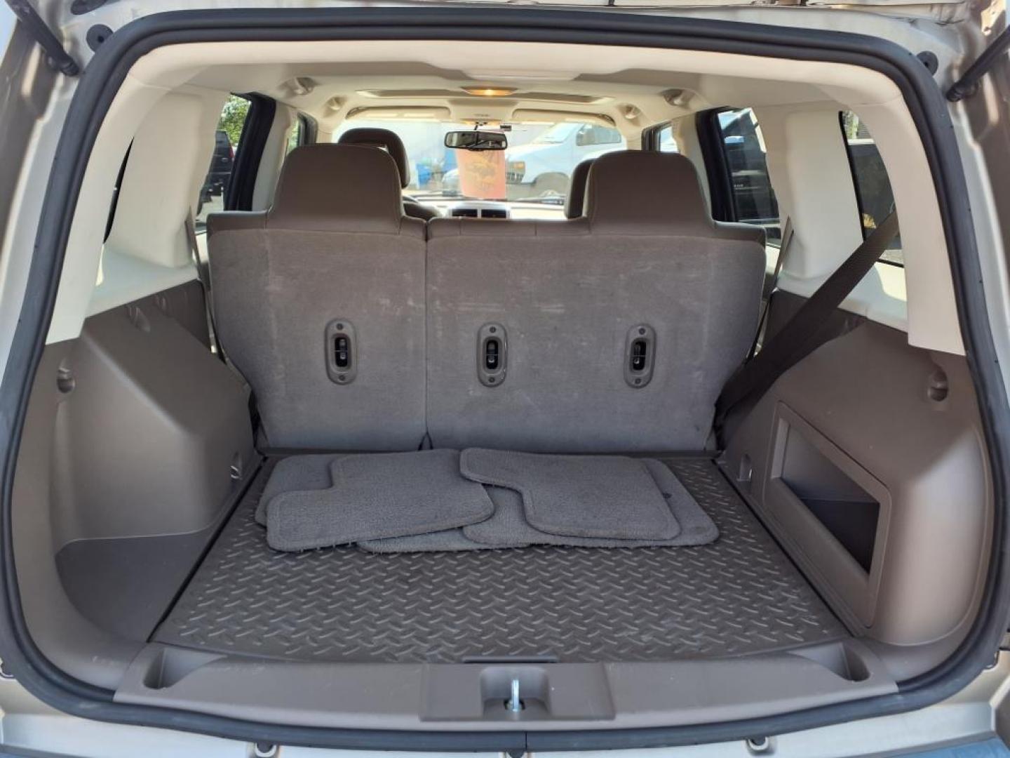 2008 Gold Jeep Patriot Limited (1J8FT48WX8D) with an 2.4L 4 Cylinder Sequential-Port F.I. engine, 4CYL transmission, located at 50 Eastern Blvd., Essex, MD, 21221, (410) 686-3444, 39.304367, -76.484947 - Photo#4