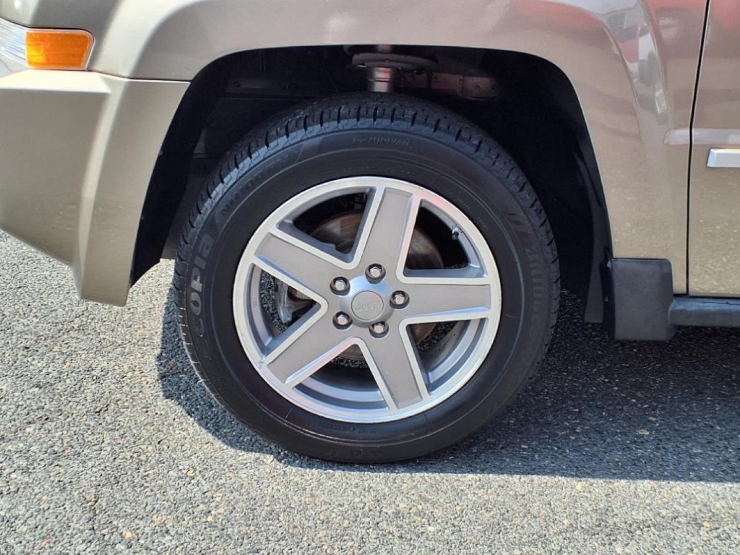 2008 Gold Jeep Patriot Limited (1J8FT48WX8D) with an 2.4L 4 Cylinder Sequential-Port F.I. engine, 4CYL transmission, located at 50 Eastern Blvd., Essex, MD, 21221, (410) 686-3444, 39.304367, -76.484947 - Photo#9