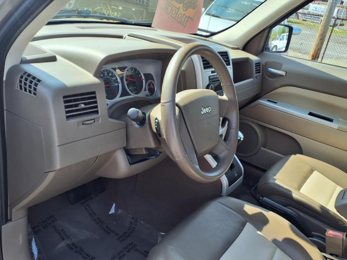 2008 Gold Jeep Patriot Limited (1J8FT48WX8D) with an 2.4L 4 Cylinder Sequential-Port F.I. engine, 4CYL transmission, located at 50 Eastern Blvd., Essex, MD, 21221, (410) 686-3444, 39.304367, -76.484947 - Photo#11