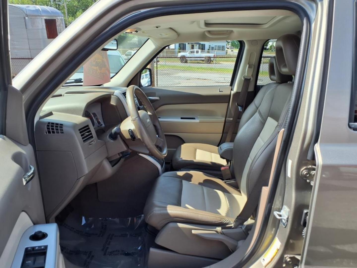 2008 Gold Jeep Patriot Limited (1J8FT48WX8D) with an 2.4L 4 Cylinder Sequential-Port F.I. engine, 4CYL transmission, located at 50 Eastern Blvd., Essex, MD, 21221, (410) 686-3444, 39.304367, -76.484947 - Photo#12