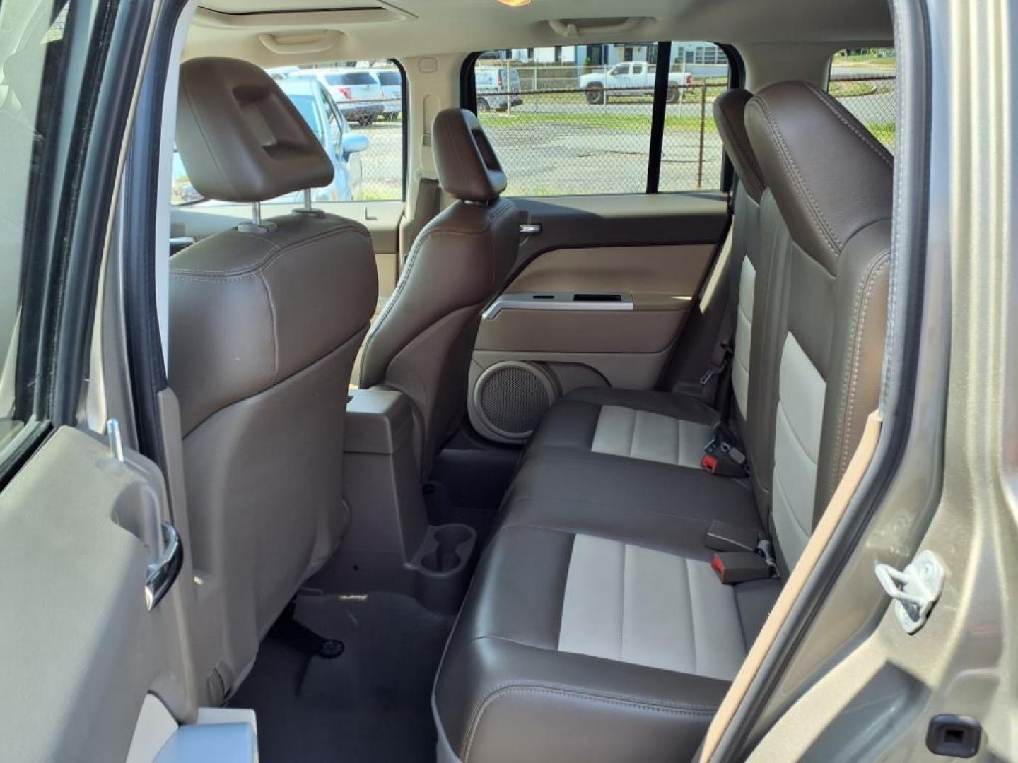 2008 Gold Jeep Patriot Limited (1J8FT48WX8D) with an 2.4L 4 Cylinder Sequential-Port F.I. engine, 4CYL transmission, located at 50 Eastern Blvd., Essex, MD, 21221, (410) 686-3444, 39.304367, -76.484947 - Photo#13