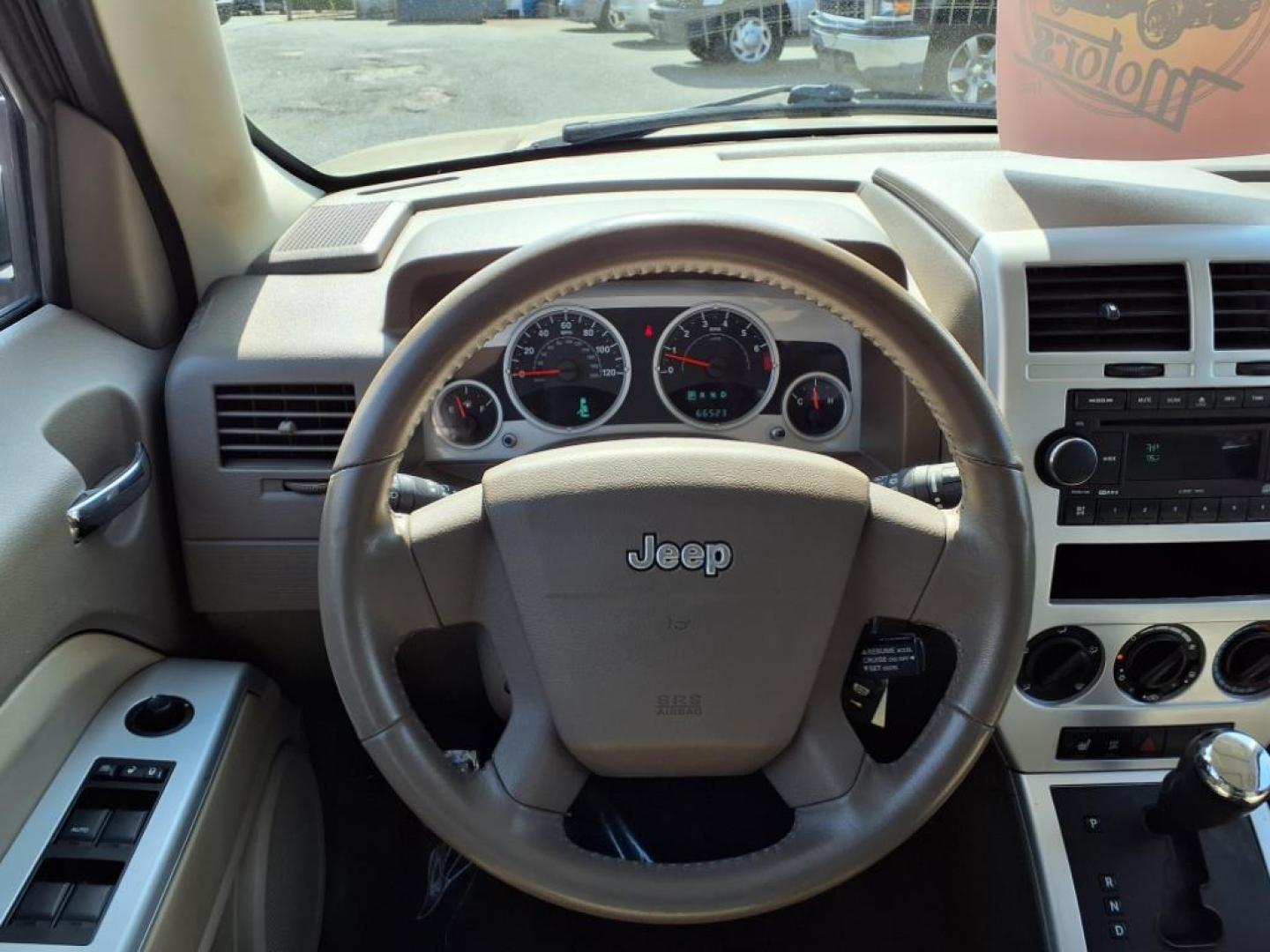 2008 Gold Jeep Patriot Limited (1J8FT48WX8D) with an 2.4L 4 Cylinder Sequential-Port F.I. engine, 4CYL transmission, located at 50 Eastern Blvd., Essex, MD, 21221, (410) 686-3444, 39.304367, -76.484947 - Photo#14