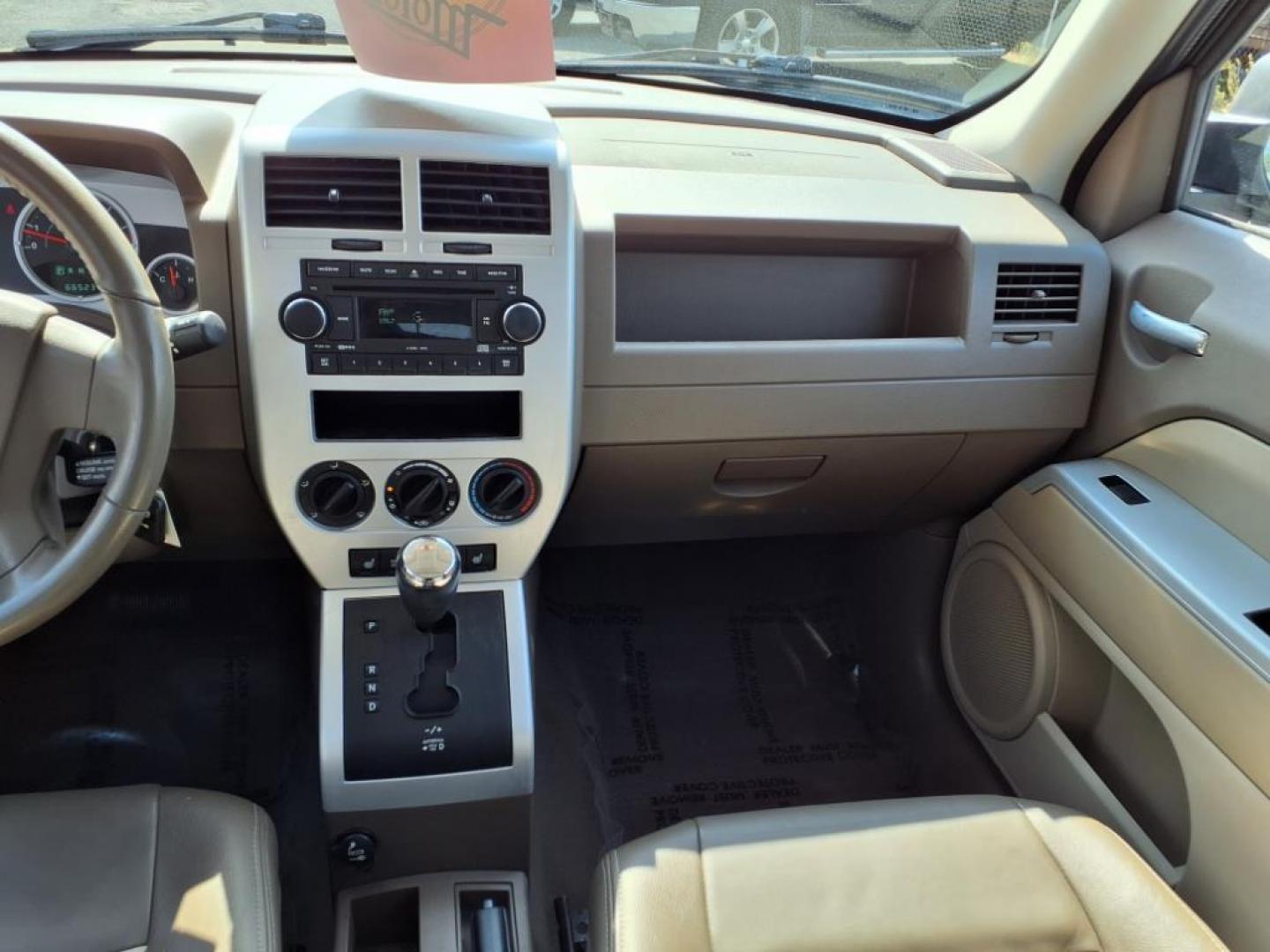2008 Gold Jeep Patriot Limited (1J8FT48WX8D) with an 2.4L 4 Cylinder Sequential-Port F.I. engine, 4CYL transmission, located at 50 Eastern Blvd., Essex, MD, 21221, (410) 686-3444, 39.304367, -76.484947 - Photo#16