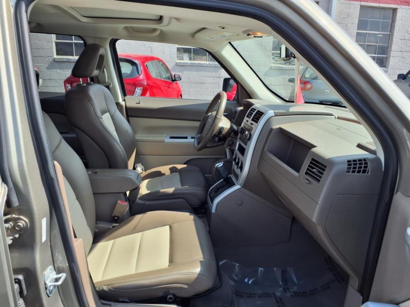 2008 Gold Jeep Patriot Limited (1J8FT48WX8D) with an 2.4L 4 Cylinder Sequential-Port F.I. engine, 4CYL transmission, located at 50 Eastern Blvd., Essex, MD, 21221, (410) 686-3444, 39.304367, -76.484947 - Photo#18