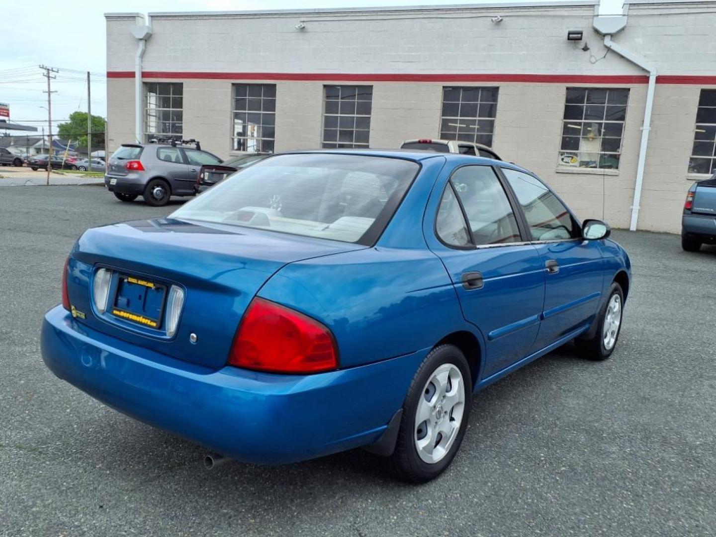 2004 Vibrant Blue Nissan Sentra 1.8 S (3N1CB51DX4L) with an 1.8L 1L NA I4 double overhead cam (DOHC) 16V Fuel Injected engine, Automatic transmission, located at 50 Eastern Blvd., Essex, MD, 21221, (410) 686-3444, 39.304367, -76.484947 - Photo#3