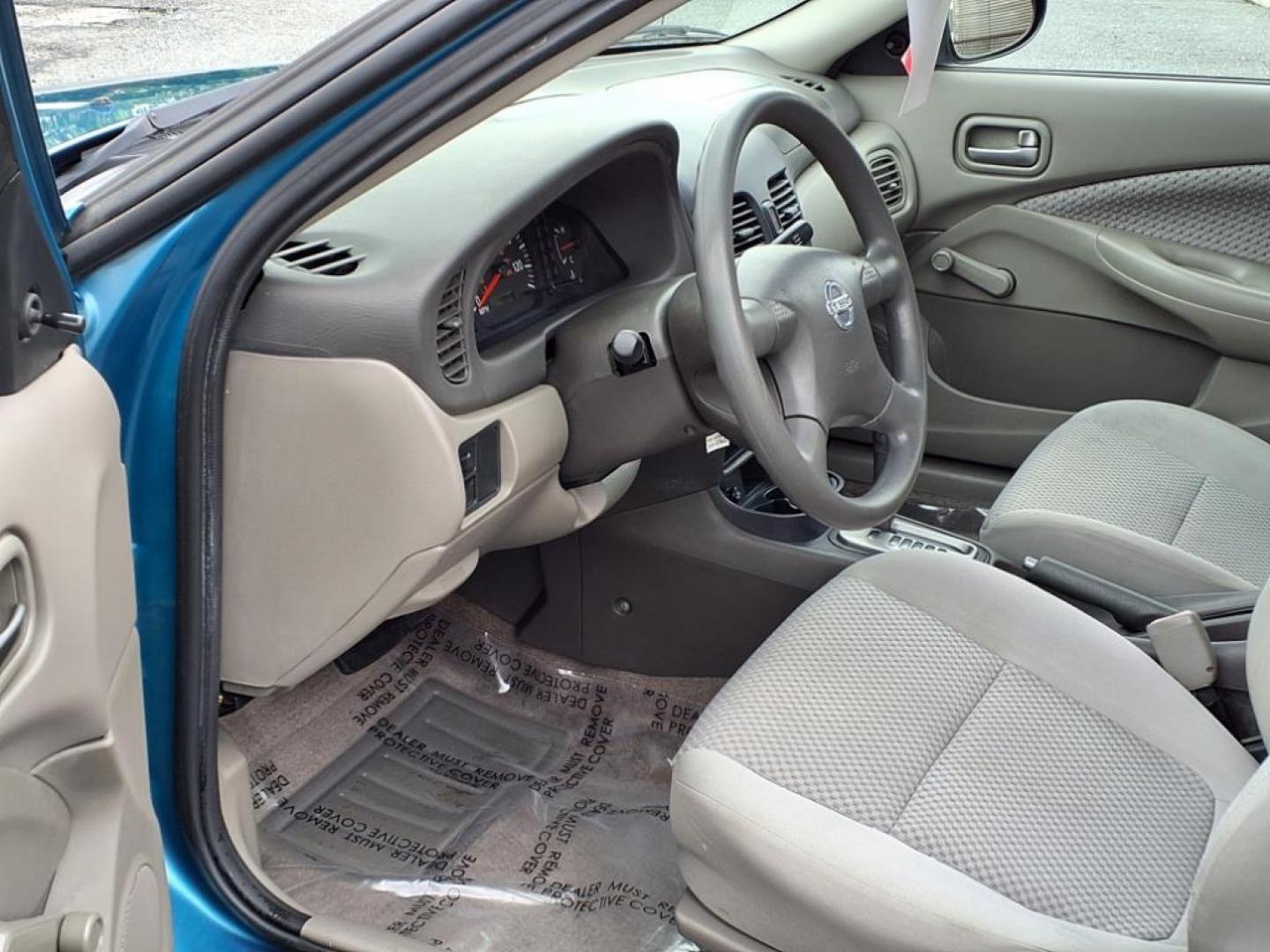 2004 Vibrant Blue Nissan Sentra 1.8 S (3N1CB51DX4L) with an 1.8L 1L NA I4 double overhead cam (DOHC) 16V Fuel Injected engine, Automatic transmission, located at 50 Eastern Blvd., Essex, MD, 21221, (410) 686-3444, 39.304367, -76.484947 - Photo#8
