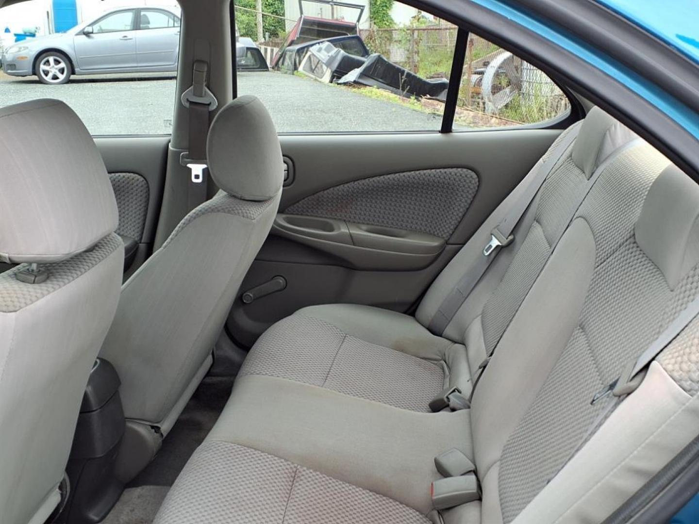 2004 Vibrant Blue Nissan Sentra 1.8 S (3N1CB51DX4L) with an 1.8L 1L NA I4 double overhead cam (DOHC) 16V Fuel Injected engine, Automatic transmission, located at 50 Eastern Blvd., Essex, MD, 21221, (410) 686-3444, 39.304367, -76.484947 - Photo#9