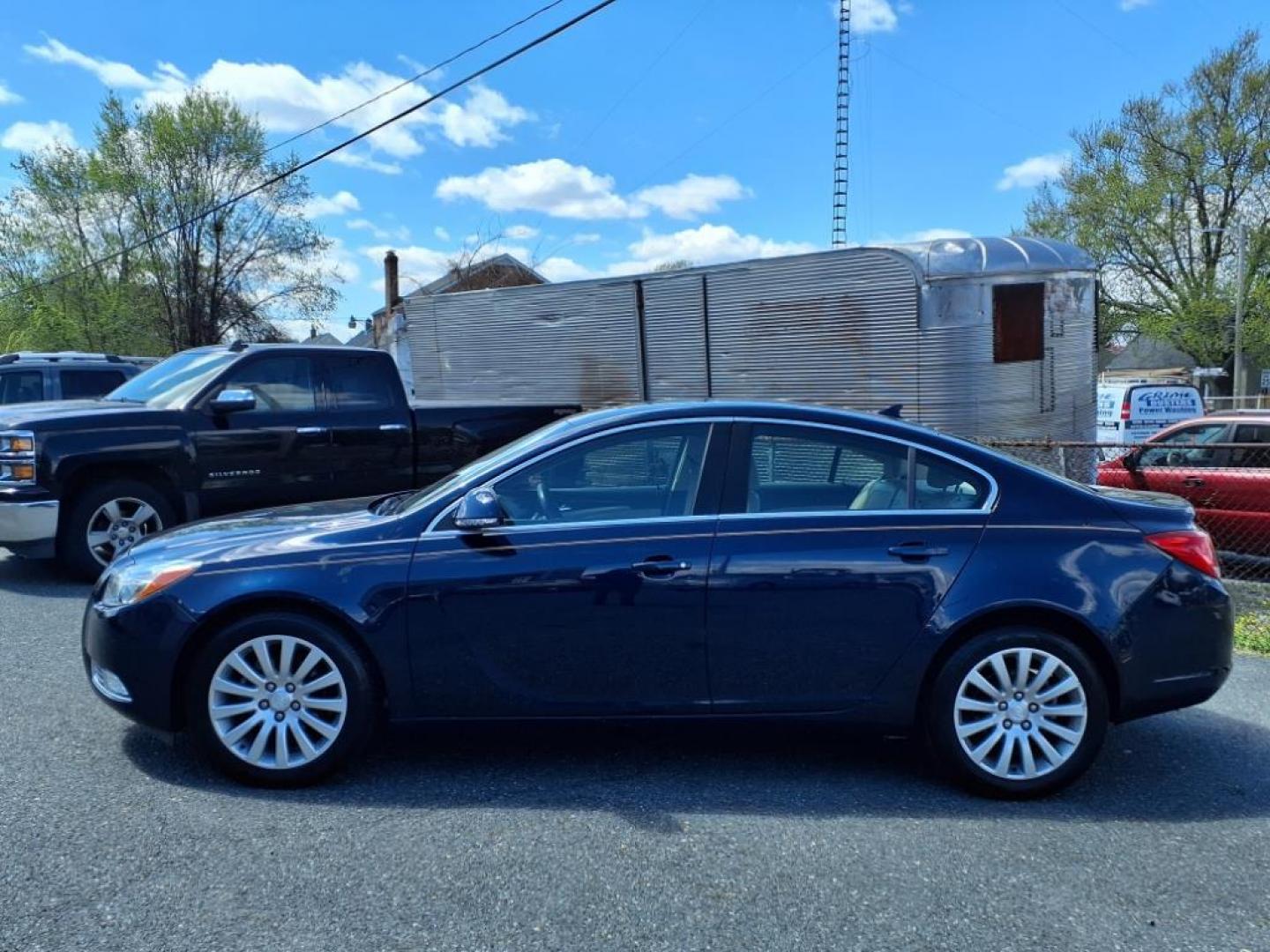 2012 Midnight Blue Metallic Buick Regal Base (2G4GR5EK8C9) with an 2.4L 4 Cylinder Fuel Injected engine, 4CYL transmission, located at 50 Eastern Blvd., Essex, MD, 21221, (410) 686-3444, 39.304367, -76.484947 - Photo#1