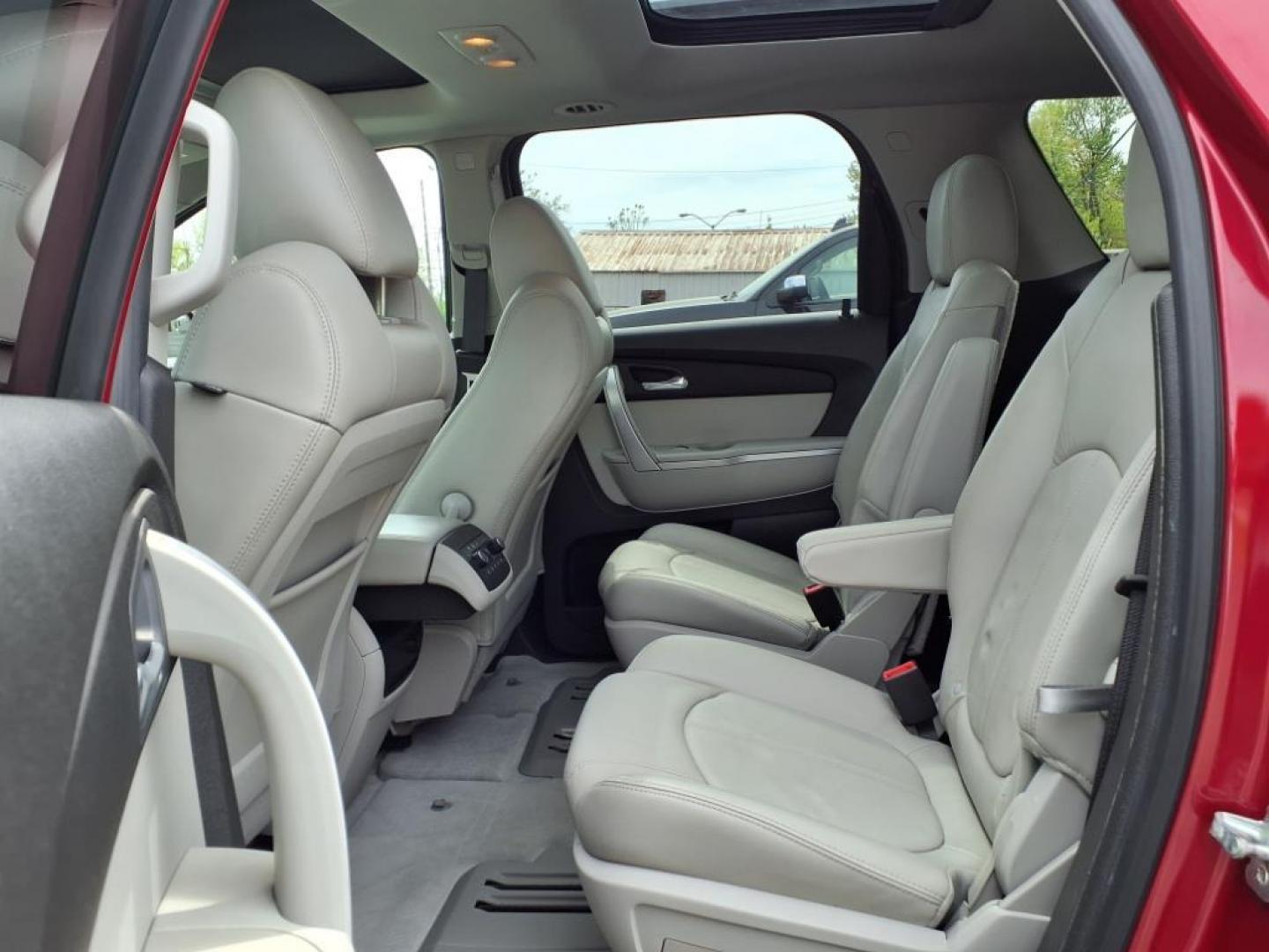 2012 Red GMC Acadia SLT-1 (1GKKRREDXCJ) with an 3.6L 6 Cylinder Fuel Injected engine, Automatic transmission, located at 50 Eastern Blvd., Essex, MD, 21221, (410) 686-3444, 39.304367, -76.484947 - Photo#13