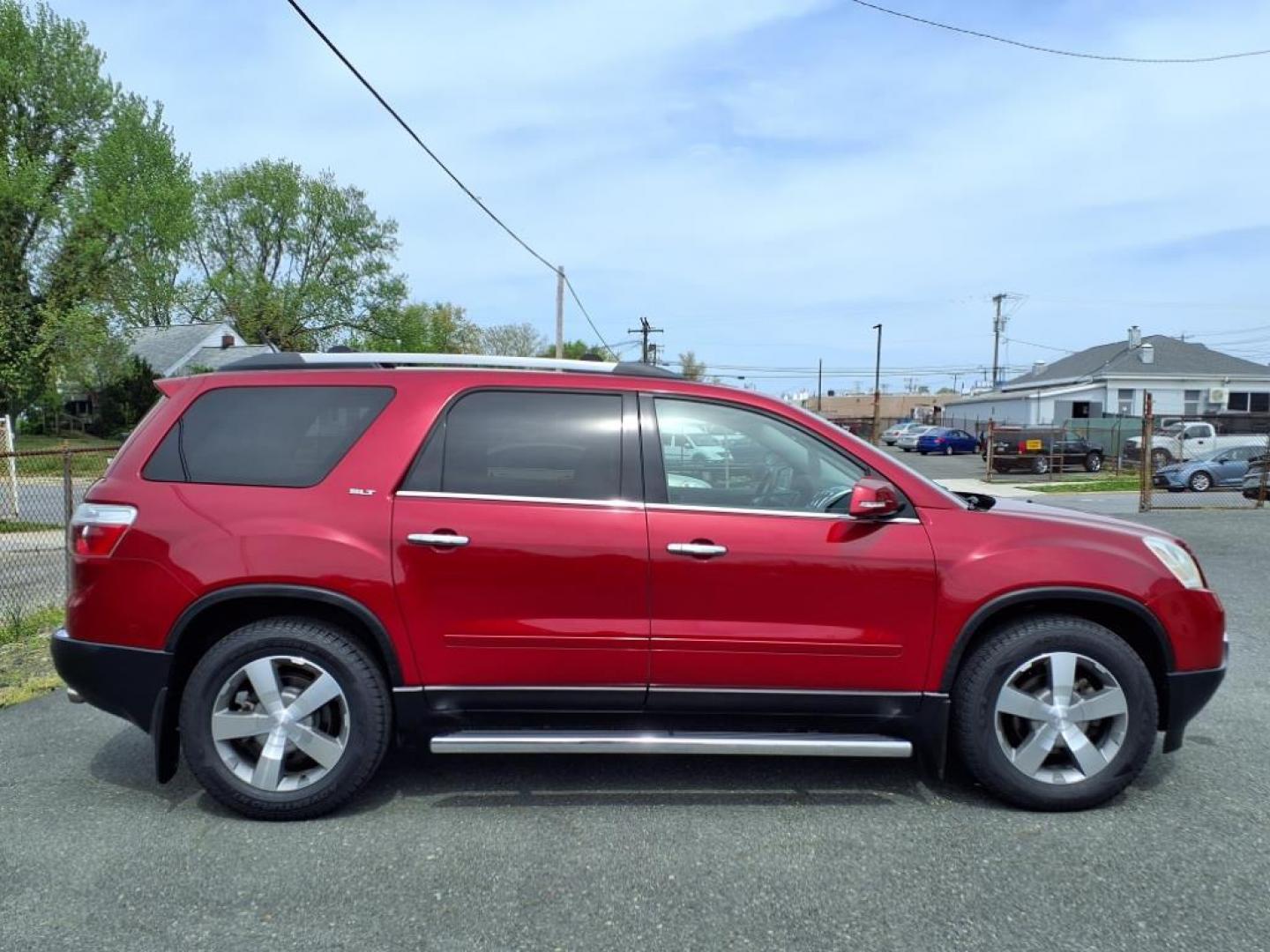 2012 Red GMC Acadia SLT-1 (1GKKRREDXCJ) with an 3.6L 6 Cylinder Fuel Injected engine, Automatic transmission, located at 50 Eastern Blvd., Essex, MD, 21221, (410) 686-3444, 39.304367, -76.484947 - Photo#6
