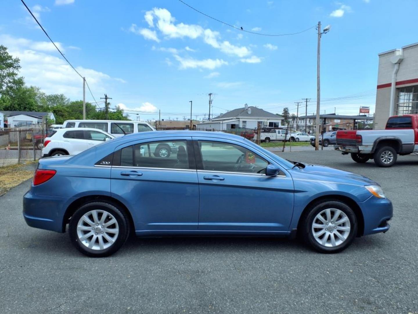 2011 Blue Chrysler 200 Touring (1C3BC1FB1BN) with an 2.4L 4 Cylinder Sequential-Port F.I. engine, Automatic transmission, located at 50 Eastern Blvd., Essex, MD, 21221, (410) 686-3444, 39.304367, -76.484947 - Photo#4