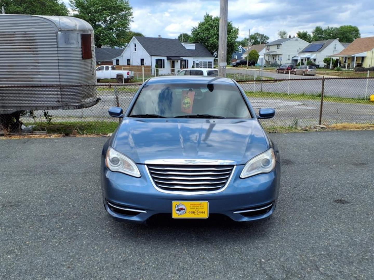 2011 Blue Chrysler 200 Touring (1C3BC1FB1BN) with an 2.4L 4 Cylinder Sequential-Port F.I. engine, Automatic transmission, located at 50 Eastern Blvd., Essex, MD, 21221, (410) 686-3444, 39.304367, -76.484947 - Photo#5