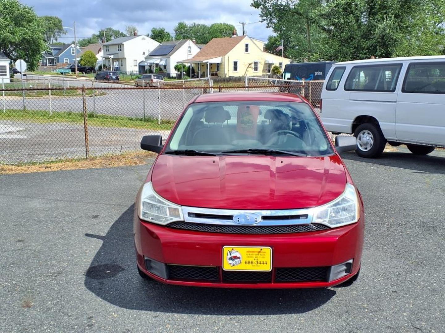2009 Sangria Red Clearcoat Metallic Ford Focus SE (1FAHP35N89W) with an 2.0L 4 Cylinder Sequential-Port F.I. engine, 4CYL AT transmission, located at 50 Eastern Blvd., Essex, MD, 21221, (410) 686-3444, 39.304367, -76.484947 - Photo#6