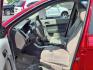 2009 Sangria Red Clearcoat Metallic Ford Focus SE (1FAHP35N89W) with an 2.0L 4 Cylinder Sequential-Port F.I. engine, 4CYL AT transmission, located at 50 Eastern Blvd., Essex, MD, 21221, (410) 686-3444, 39.304367, -76.484947 - Photo#10
