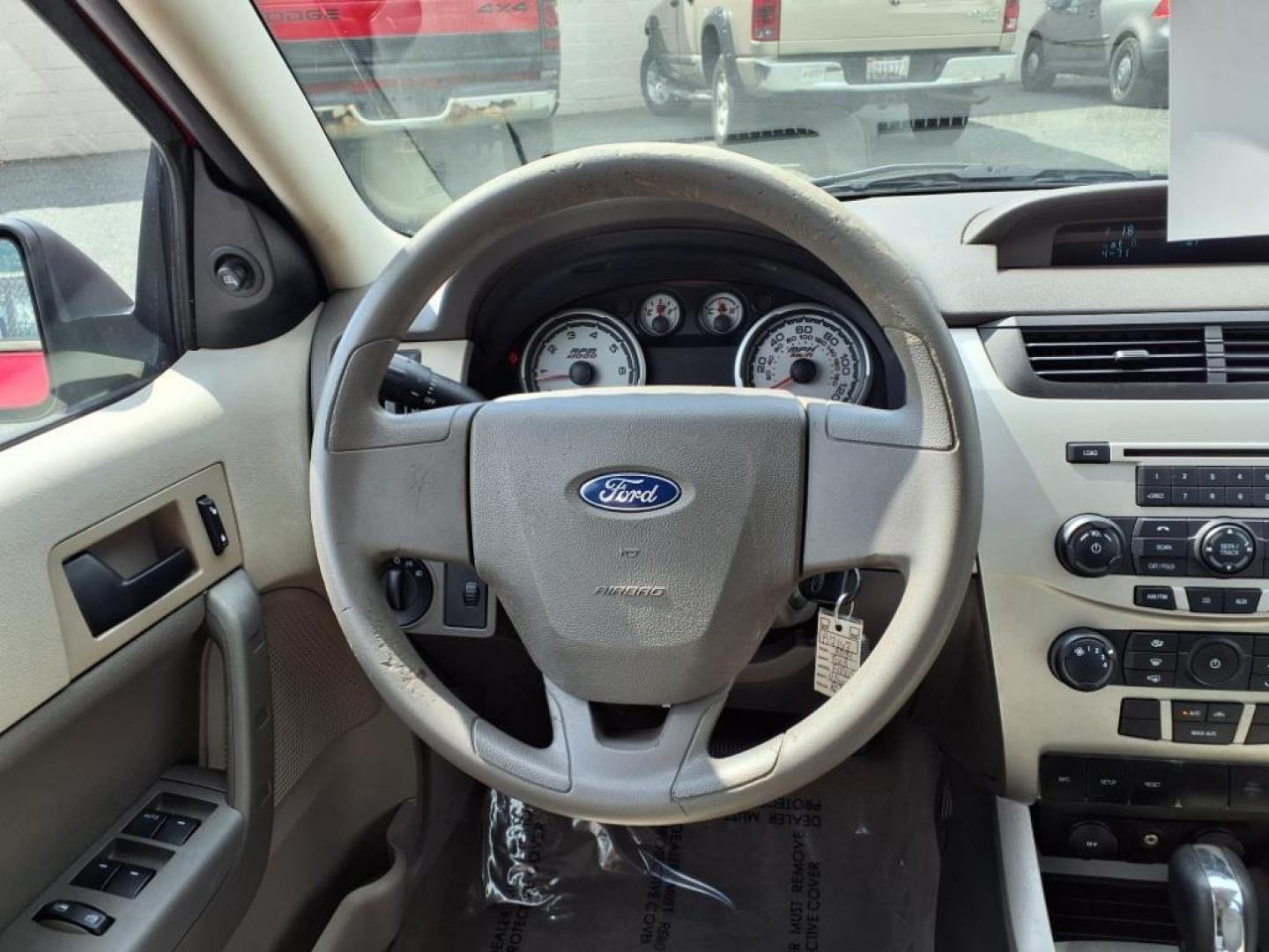 2009 Sangria Red Clearcoat Metallic Ford Focus SE (1FAHP35N89W) with an 2.0L 4 Cylinder Sequential-Port F.I. engine, 4CYL AT transmission, located at 50 Eastern Blvd., Essex, MD, 21221, (410) 686-3444, 39.304367, -76.484947 - Photo#12