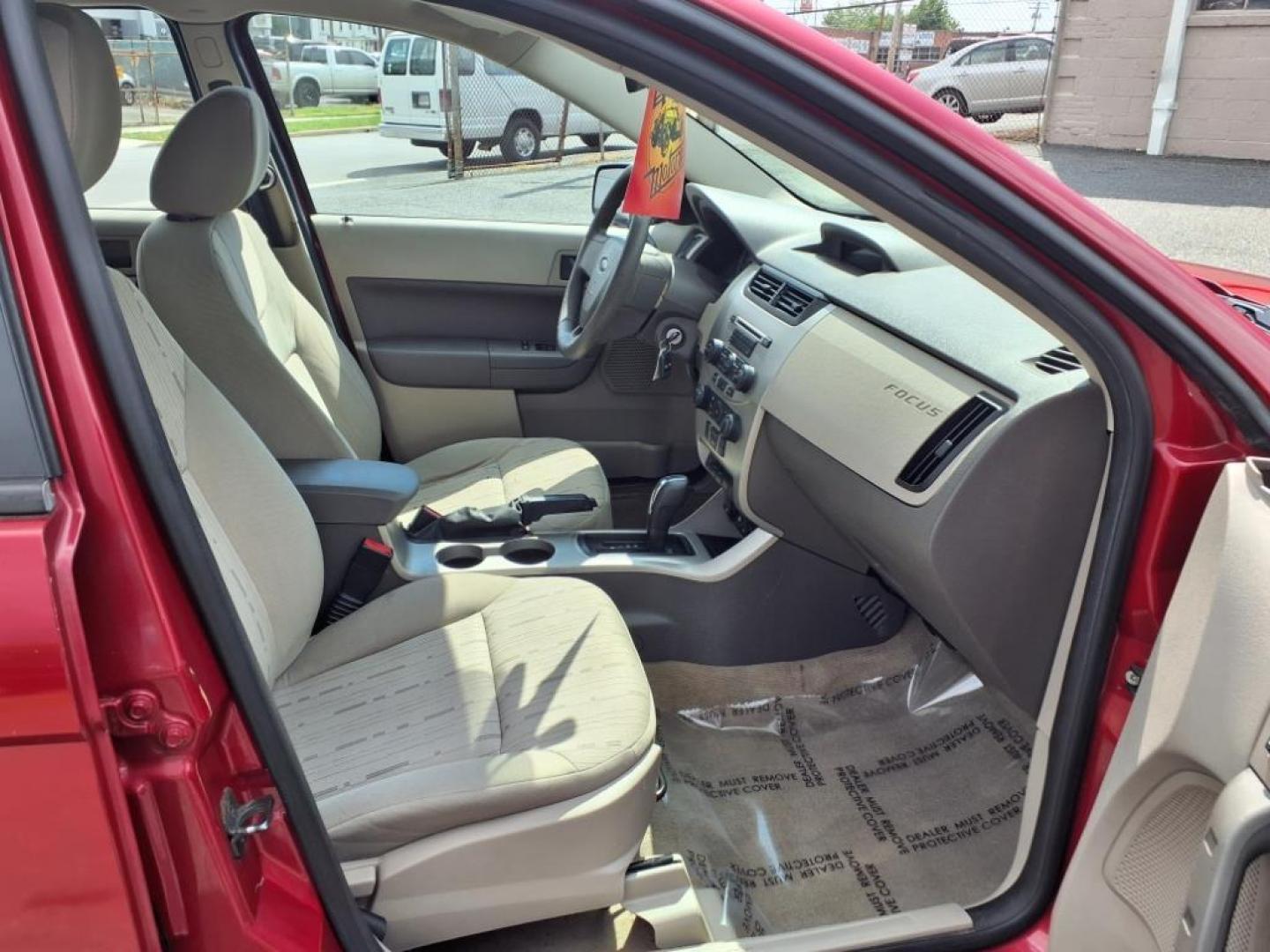 2009 Sangria Red Clearcoat Metallic Ford Focus SE (1FAHP35N89W) with an 2.0L 4 Cylinder Sequential-Port F.I. engine, 4CYL AT transmission, located at 50 Eastern Blvd., Essex, MD, 21221, (410) 686-3444, 39.304367, -76.484947 - Photo#15