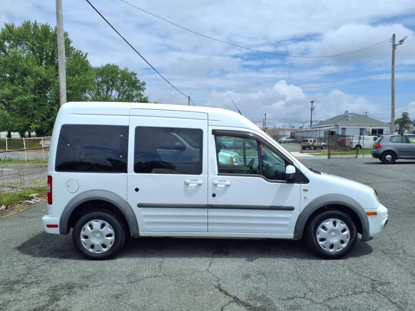2012 White Ford Transit Connect XLT Premium (NM0KS9CN4CT) with an 2.0L 4 Cylinder Sequential-Port F.I. engine, 4CYL AT transmission, located at 50 Eastern Blvd., Essex, MD, 21221, (410) 686-3444, 39.304367, -76.484947 - Photo#5