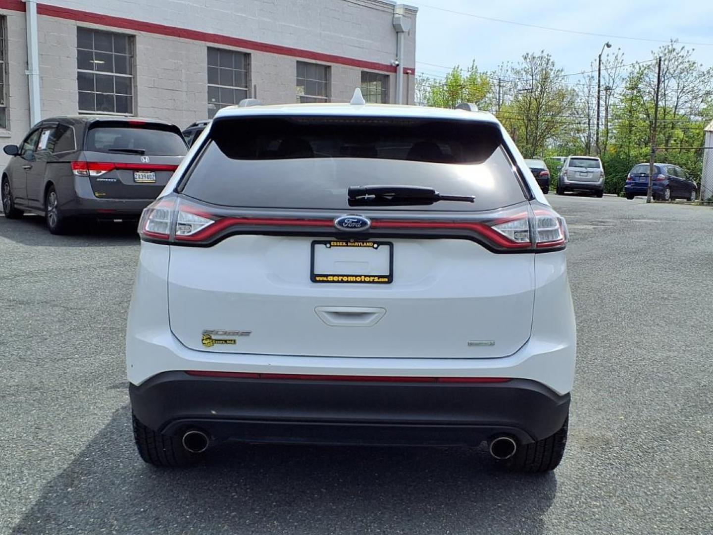 2015 Oxford White Ford Edge SE (2FMTK3G92FB) with an 2.0L 4 Cylinder Turbocharged engine, Automatic transmission, located at 50 Eastern Blvd., Essex, MD, 21221, (410) 686-3444, 39.304367, -76.484947 - Photo#2