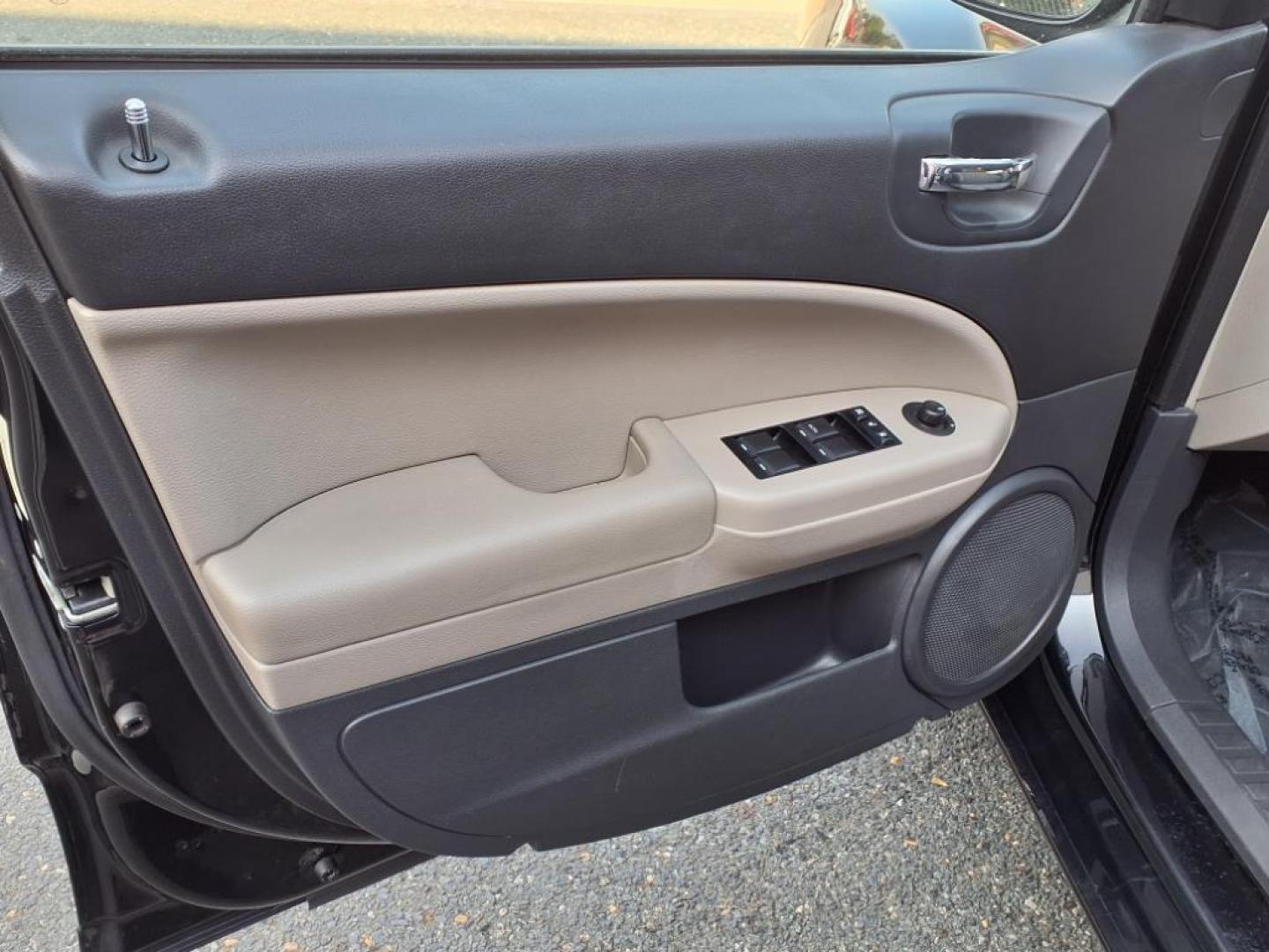 2011 Black Dodge Caliber Mainstreet (1B3CB3HAXBD) with an 2.0L 4 Cylinder Sequential-Port F.I. engine, 4CYL AT transmission, located at 50 Eastern Blvd., Essex, MD, 21221, (410) 686-3444, 39.304367, -76.484947 - Photo#9