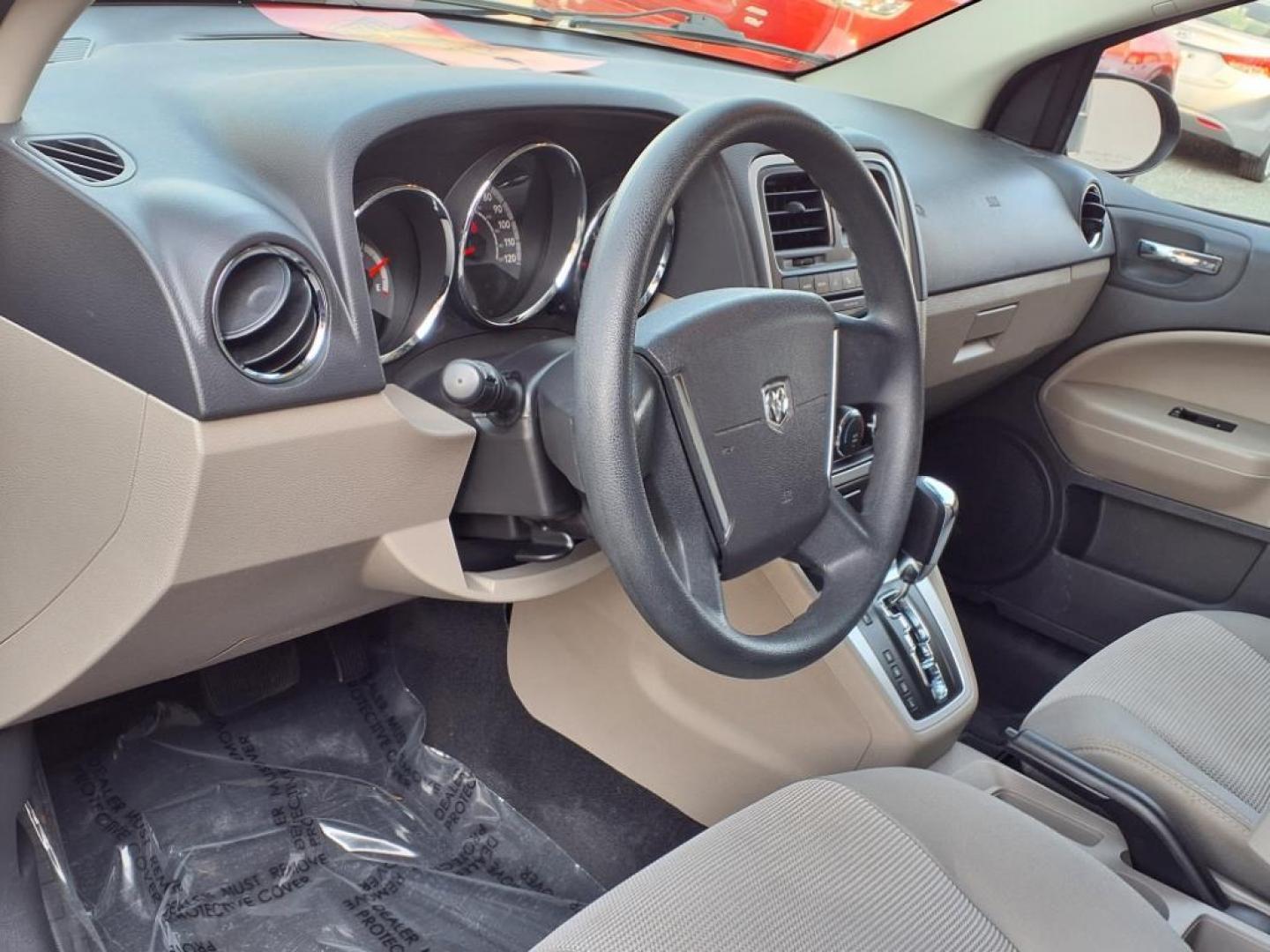 2011 Black Dodge Caliber Mainstreet (1B3CB3HAXBD) with an 2.0L 4 Cylinder Sequential-Port F.I. engine, 4CYL AT transmission, located at 50 Eastern Blvd., Essex, MD, 21221, (410) 686-3444, 39.304367, -76.484947 - Photo#10