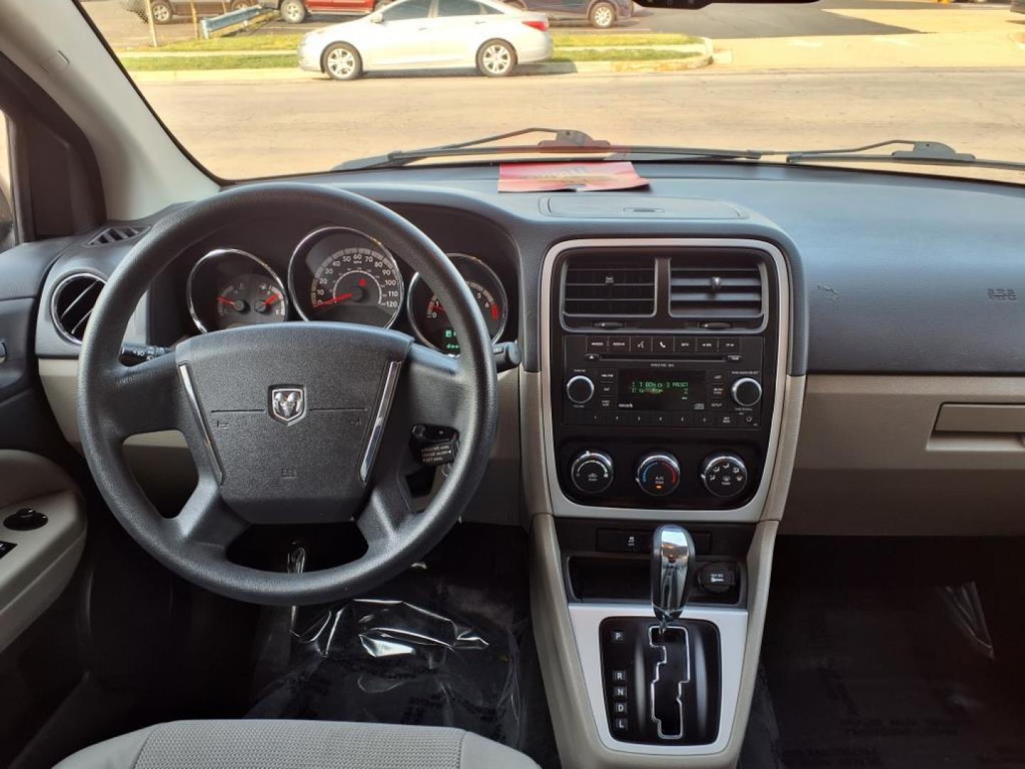 2011 Black Dodge Caliber Mainstreet (1B3CB3HAXBD) with an 2.0L 4 Cylinder Sequential-Port F.I. engine, 4CYL AT transmission, located at 50 Eastern Blvd., Essex, MD, 21221, (410) 686-3444, 39.304367, -76.484947 - Photo#13
