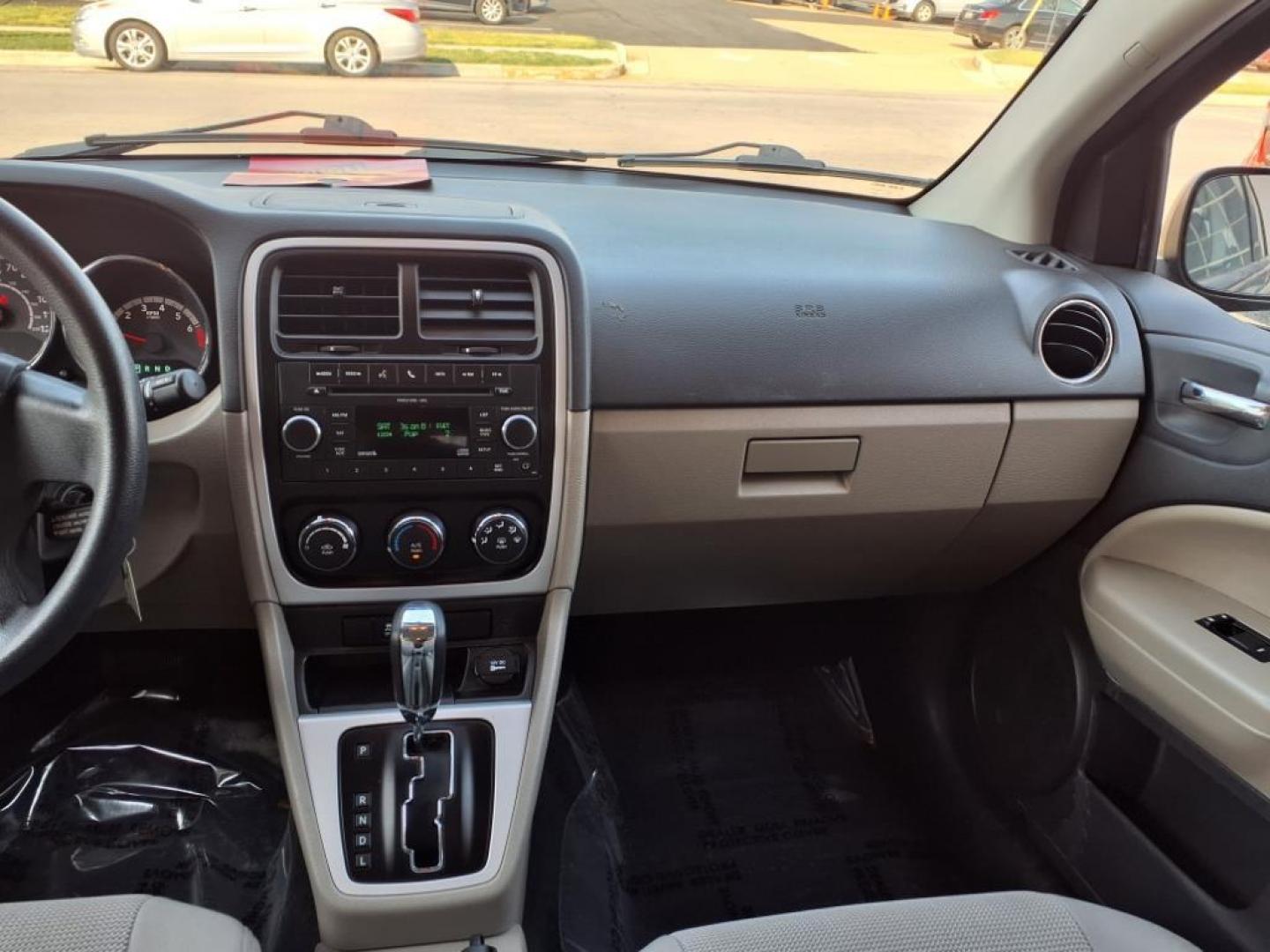 2011 Black Dodge Caliber Mainstreet (1B3CB3HAXBD) with an 2.0L 4 Cylinder Sequential-Port F.I. engine, 4CYL AT transmission, located at 50 Eastern Blvd., Essex, MD, 21221, (410) 686-3444, 39.304367, -76.484947 - Photo#14