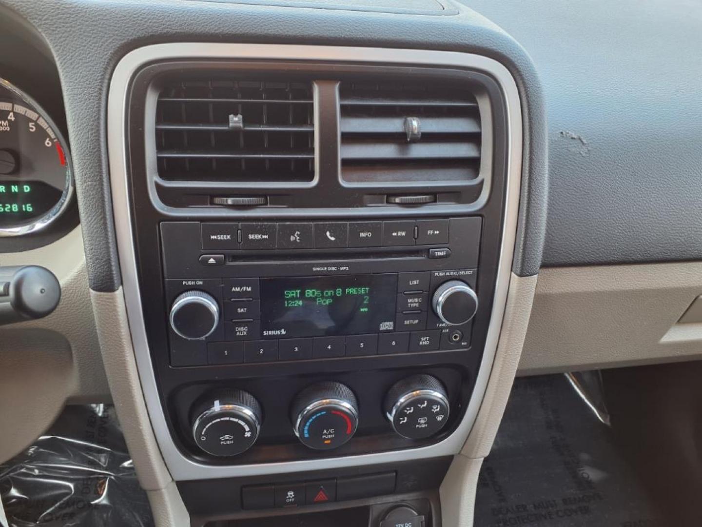 2011 Black Dodge Caliber Mainstreet (1B3CB3HAXBD) with an 2.0L 4 Cylinder Sequential-Port F.I. engine, 4CYL AT transmission, located at 50 Eastern Blvd., Essex, MD, 21221, (410) 686-3444, 39.304367, -76.484947 - Photo#17