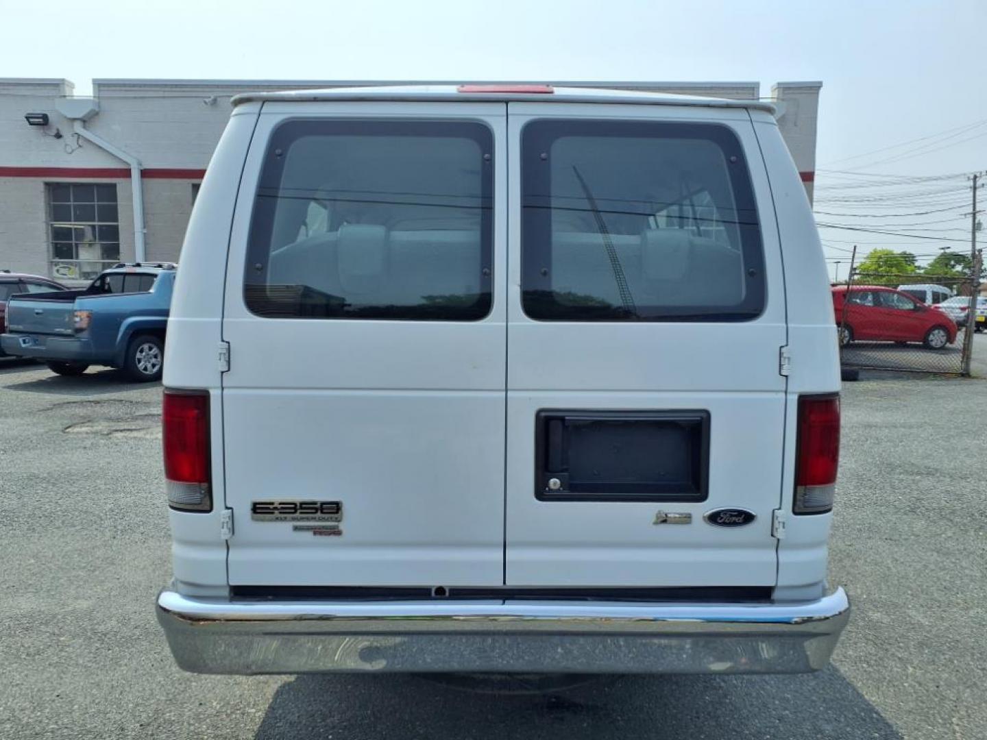 2012 White Ford E-Series E-350 SD XLT (1FBSS3BL8CD) with an 5.4L 8 Cylinder Sequential-Port F.I. engine, Automatic transmission, located at 50 Eastern Blvd., Essex, MD, 21221, (410) 686-3444, 39.304367, -76.484947 - Photo#3