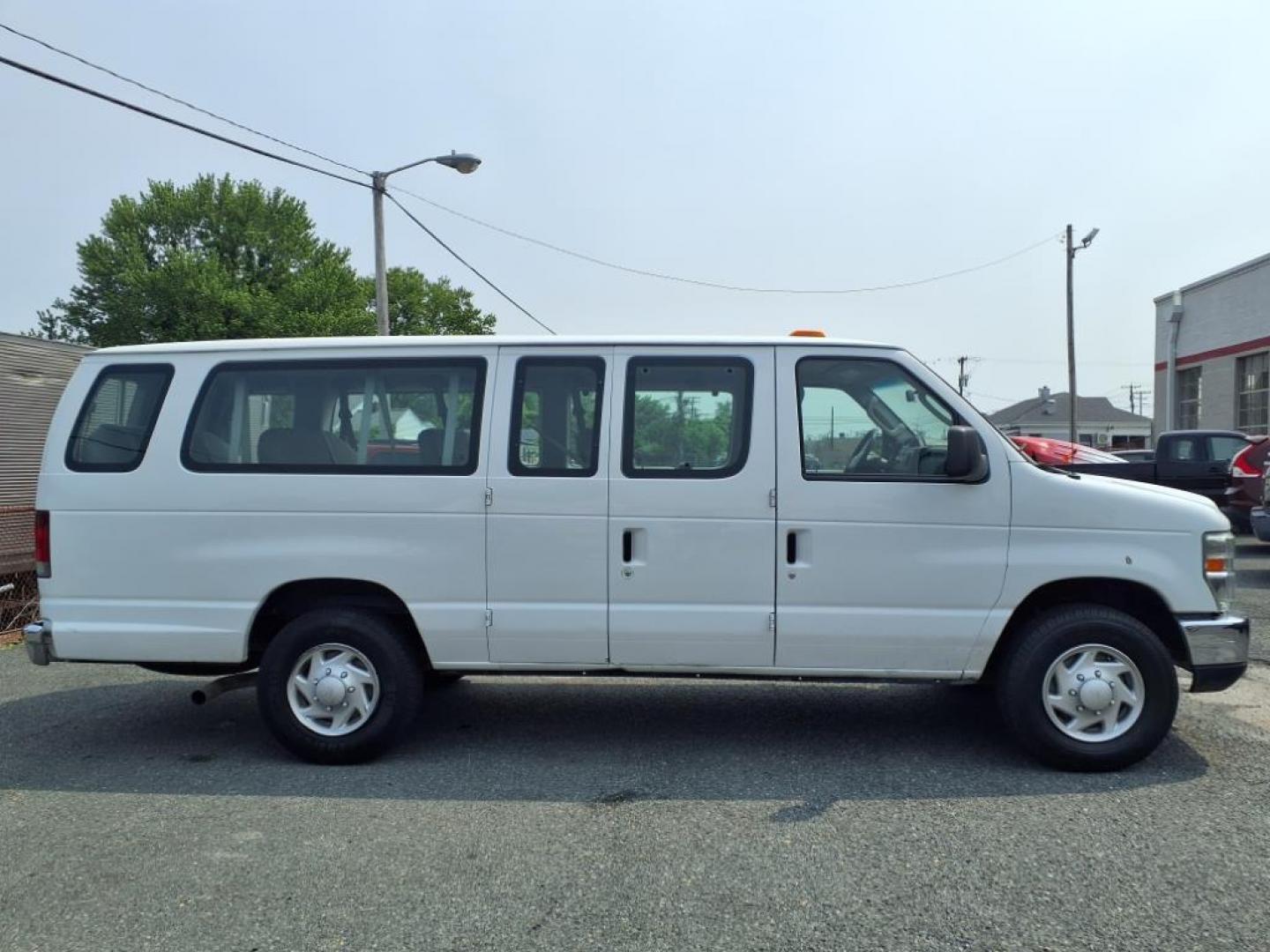 2012 White Ford E-Series E-350 SD XLT (1FBSS3BL8CD) with an 5.4L 8 Cylinder Sequential-Port F.I. engine, Automatic transmission, located at 50 Eastern Blvd., Essex, MD, 21221, (410) 686-3444, 39.304367, -76.484947 - Photo#6