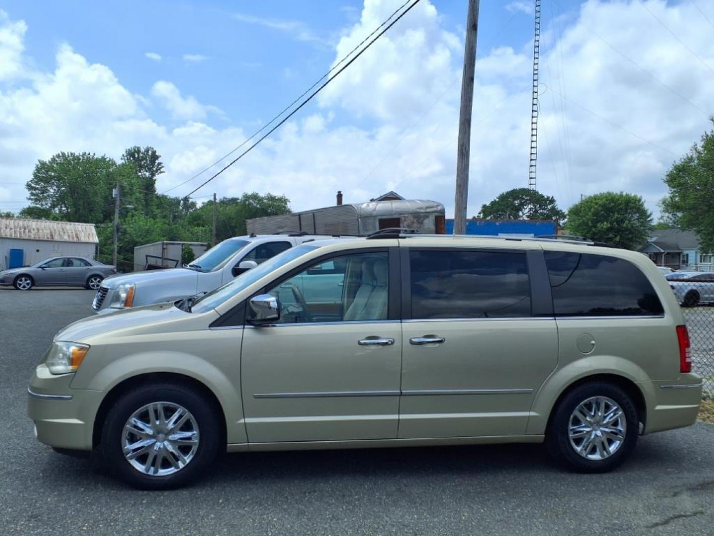 2010 White Gold Clear Coat Chrysler Town and Country Limited (2A4RR6DX2AR) with an 4.0L 6 Cylinder Sequential-Port F.I. engine, V6 AT transmission, located at 50 Eastern Blvd., Essex, MD, 21221, (410) 686-3444, 39.304367, -76.484947 - Photo#1