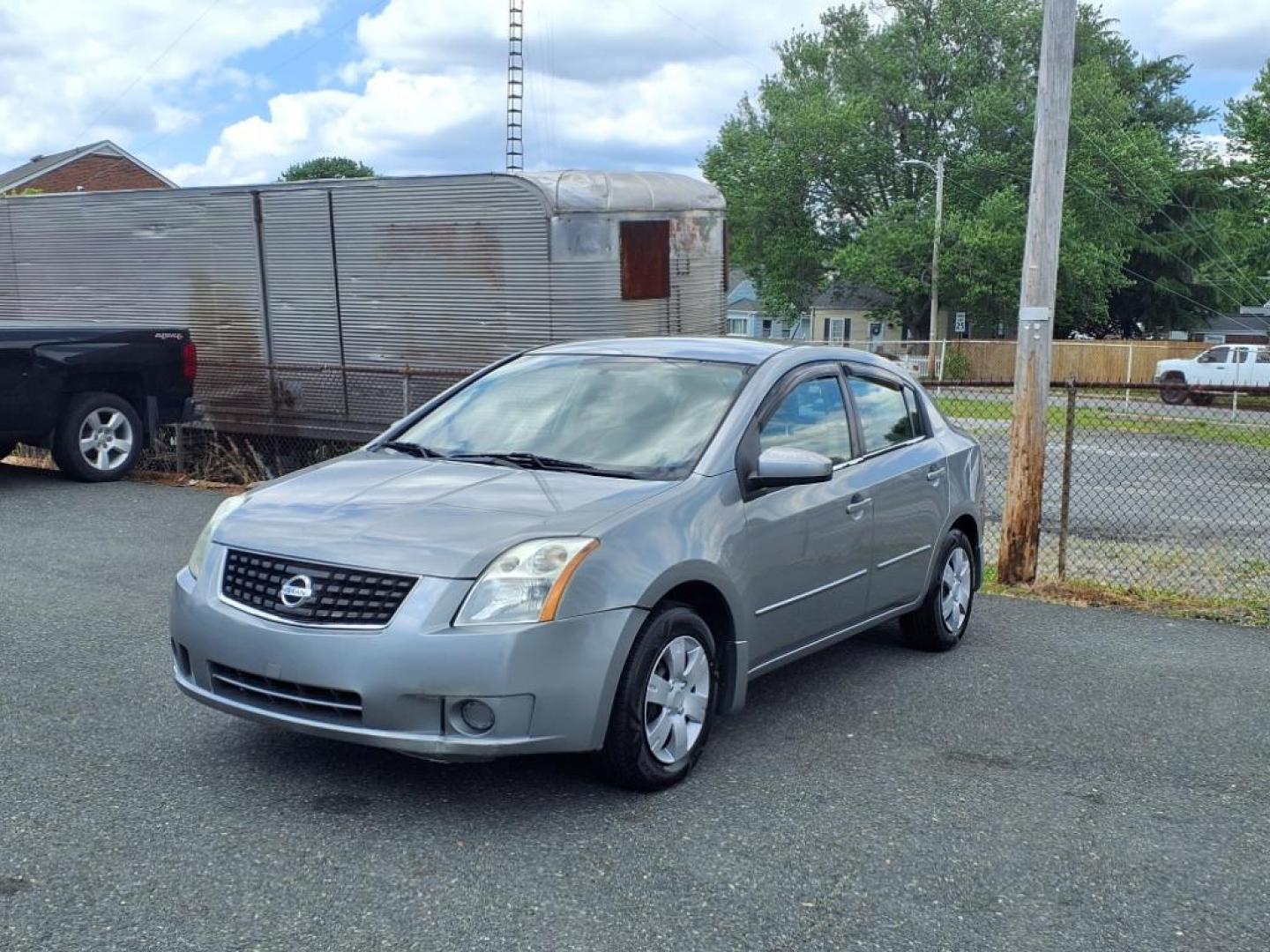 2009 Gray Nissan Sentra 2.0 S (3N1AB61E09L) with an 2.0L 2.0L I4 140hp 147ft. lbs. Sequential-Port F.I. engine, CVT transmission, located at 50 Eastern Blvd., Essex, MD, 21221, (410) 686-3444, 39.304367, -76.484947 - Photo#0