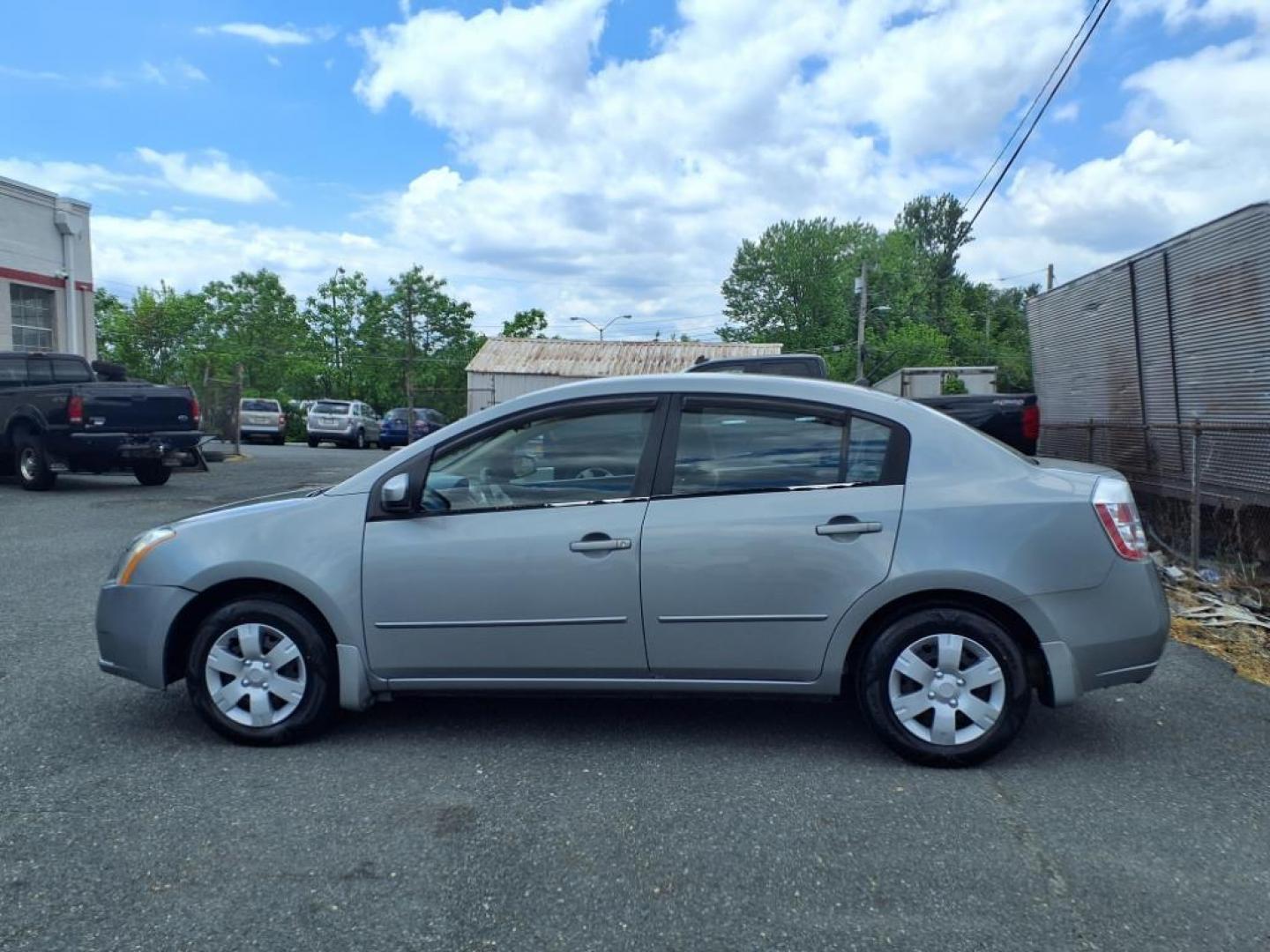 2009 Gray Nissan Sentra 2.0 S (3N1AB61E09L) with an 2.0L 2.0L I4 140hp 147ft. lbs. Sequential-Port F.I. engine, CVT transmission, located at 50 Eastern Blvd., Essex, MD, 21221, (410) 686-3444, 39.304367, -76.484947 - Photo#1