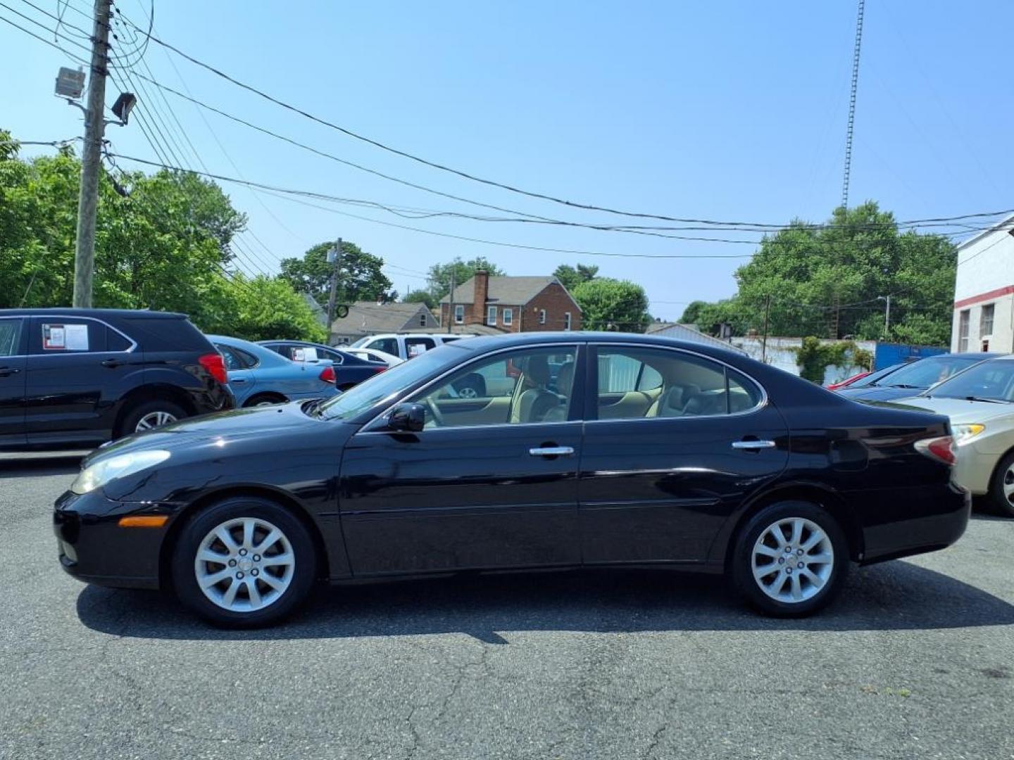 2002 Black Onyx Lexus ES 300 Base (JTHBF30G320) with an 3.0L 6 Cylinder Fuel Injected engine, V6 AT transmission, located at 50 Eastern Blvd., Essex, MD, 21221, (410) 686-3444, 39.304367, -76.484947 - Photo#1