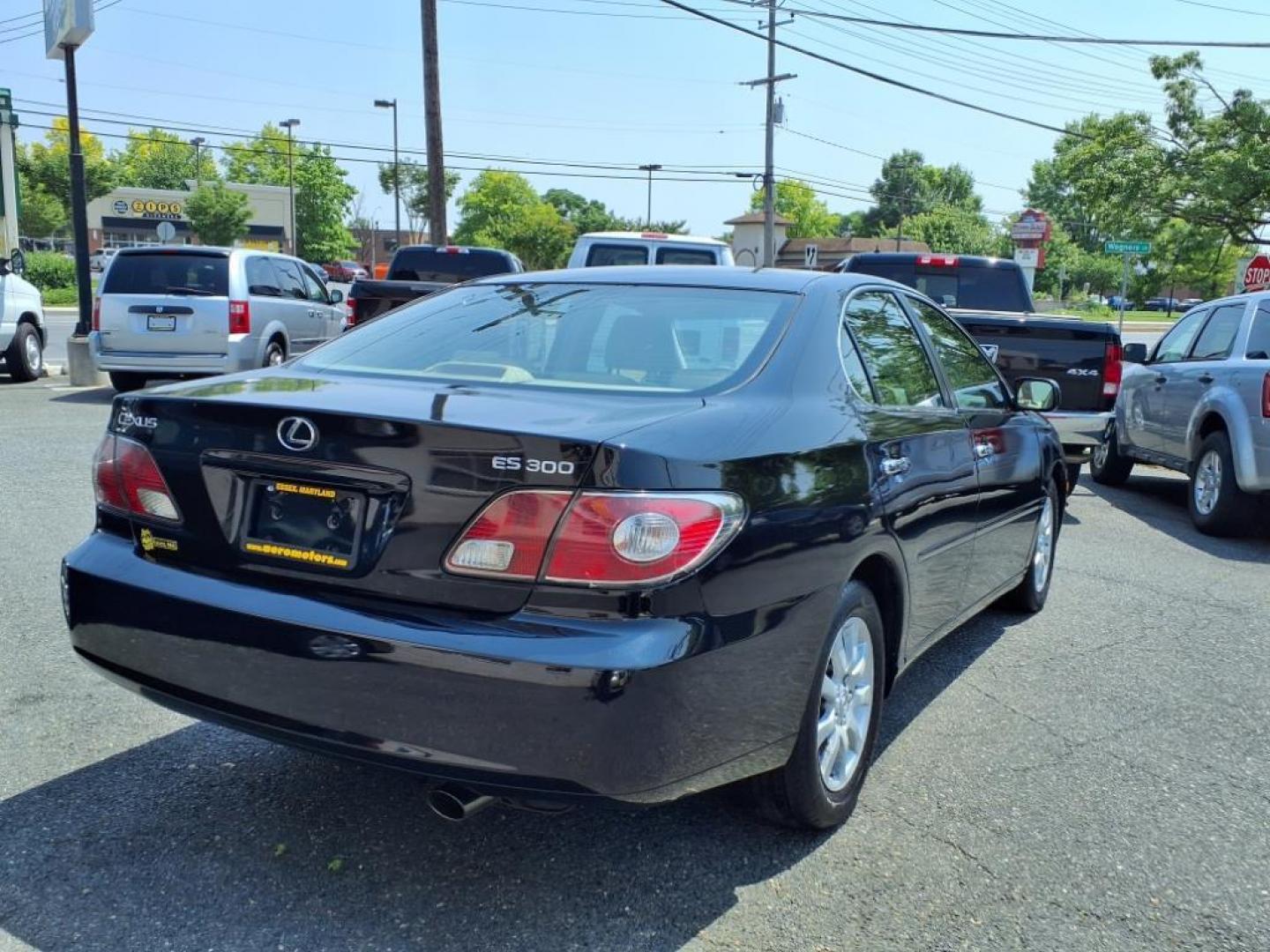 2002 Black Onyx Lexus ES 300 Base (JTHBF30G320) with an 3.0L 6 Cylinder Fuel Injected engine, V6 AT transmission, located at 50 Eastern Blvd., Essex, MD, 21221, (410) 686-3444, 39.304367, -76.484947 - Photo#4