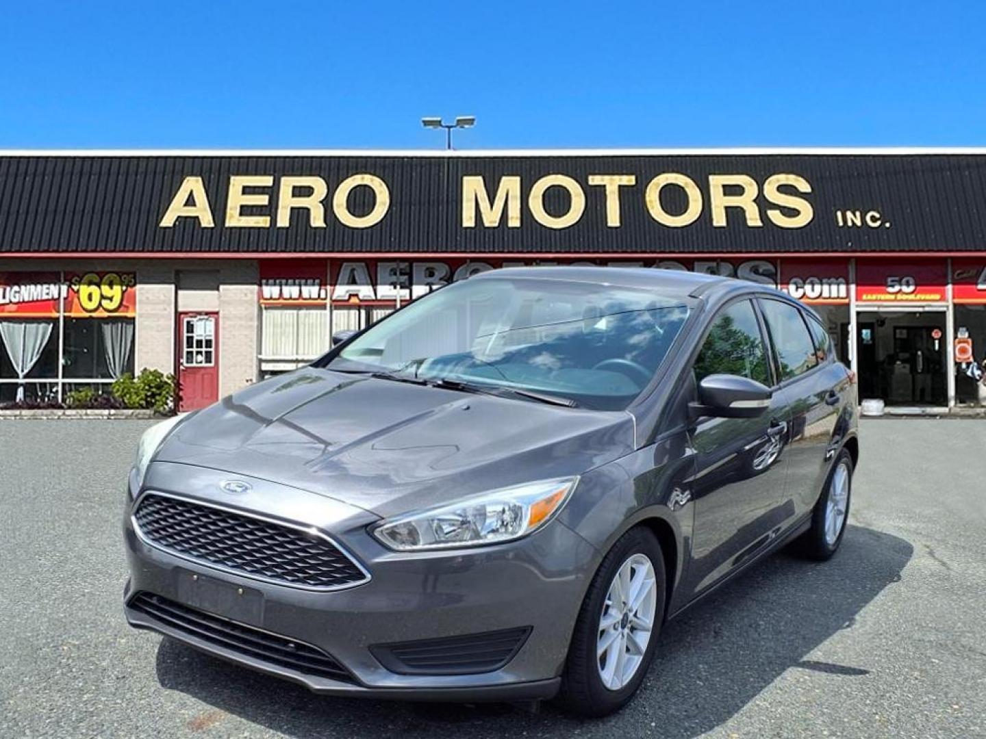 2015 Magnetic Ford Focus SE (1FADP3K26FL) with an 2.0L 4 Cylinder Fuel Injected engine, 4CYL AT transmission, located at 50 Eastern Blvd., Essex, MD, 21221, (410) 686-3444, 39.304367, -76.484947 - Photo#0
