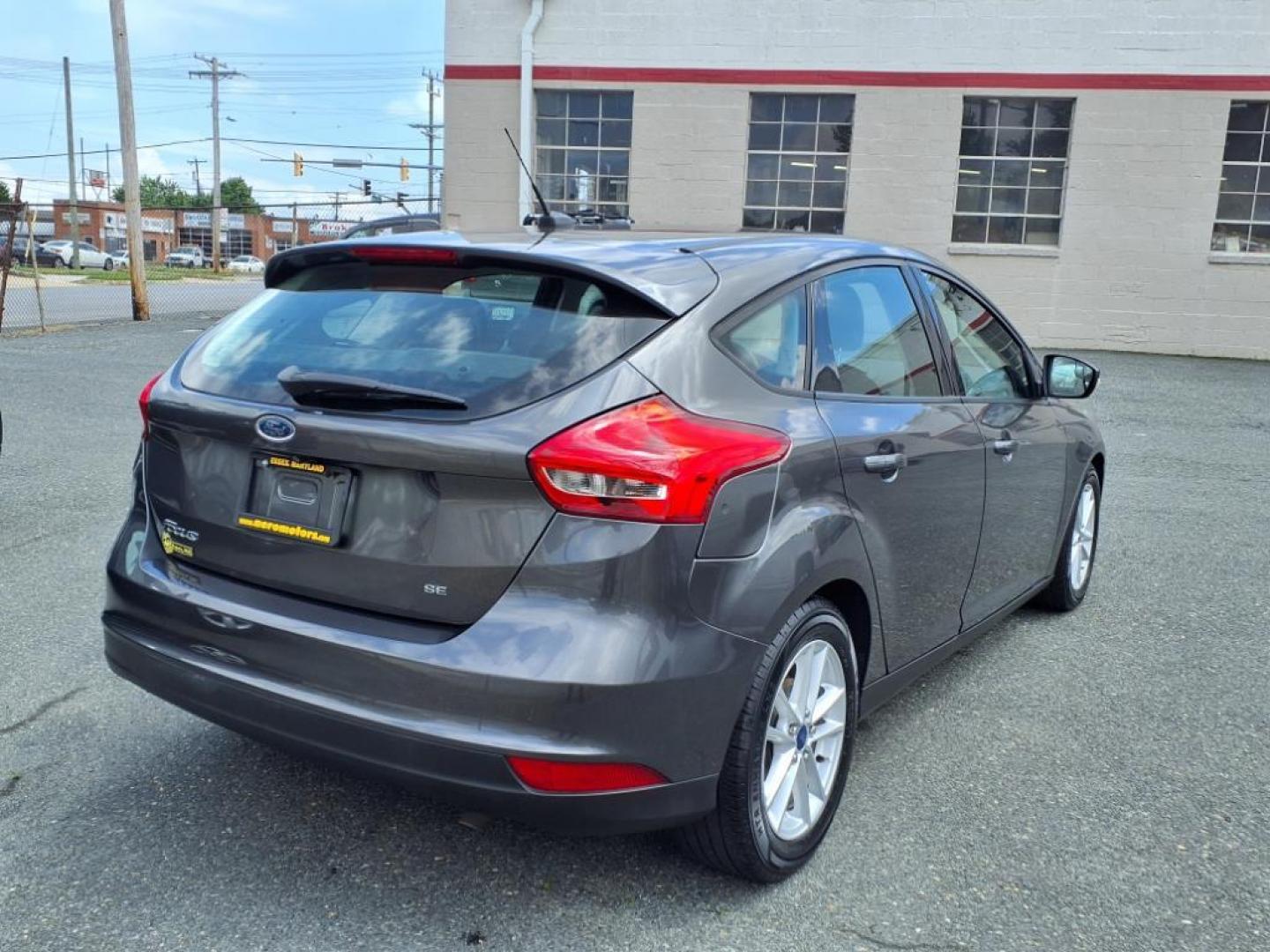 2015 Magnetic Ford Focus SE (1FADP3K26FL) with an 2.0L 4 Cylinder Fuel Injected engine, 4CYL AT transmission, located at 50 Eastern Blvd., Essex, MD, 21221, (410) 686-3444, 39.304367, -76.484947 - Photo#5