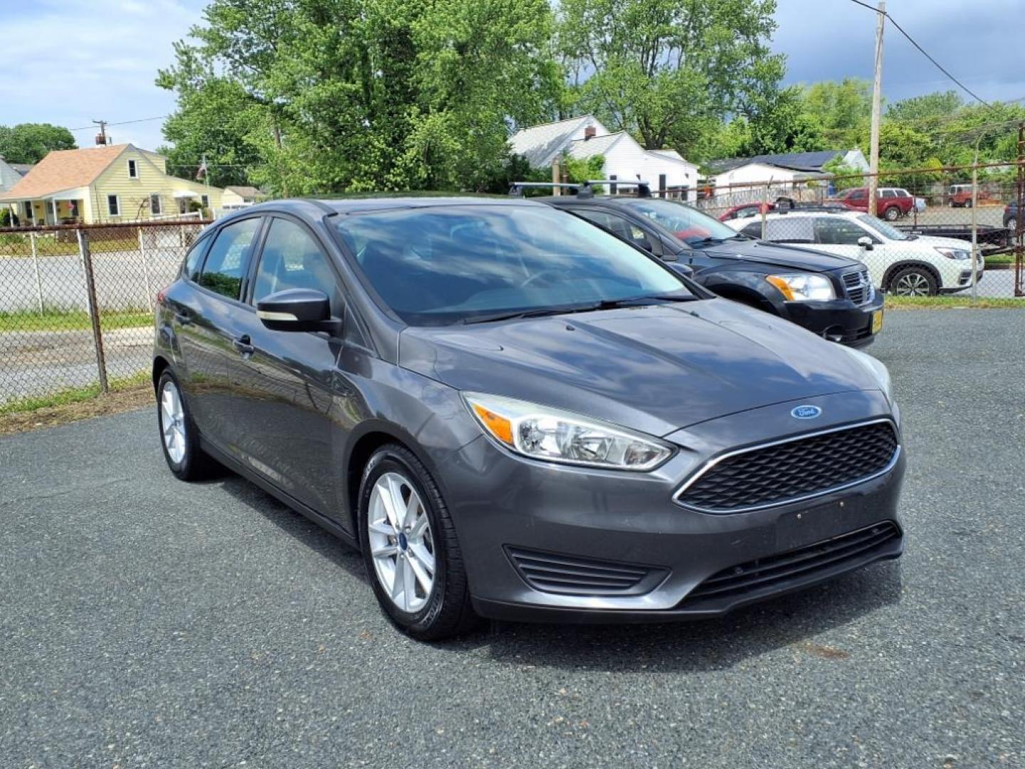 2015 Magnetic Ford Focus SE (1FADP3K26FL) with an 2.0L 4 Cylinder Fuel Injected engine, 4CYL AT transmission, located at 50 Eastern Blvd., Essex, MD, 21221, (410) 686-3444, 39.304367, -76.484947 - Photo#7