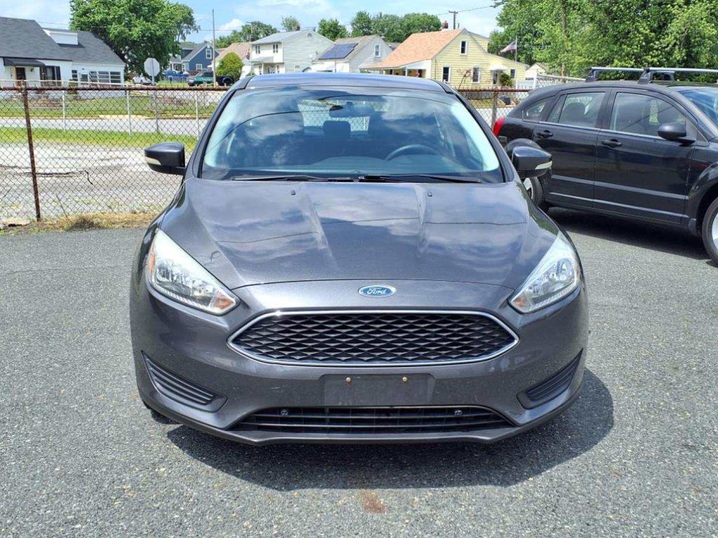 2015 Magnetic Ford Focus SE (1FADP3K26FL) with an 2.0L 4 Cylinder Fuel Injected engine, 4CYL AT transmission, located at 50 Eastern Blvd., Essex, MD, 21221, (410) 686-3444, 39.304367, -76.484947 - Photo#8