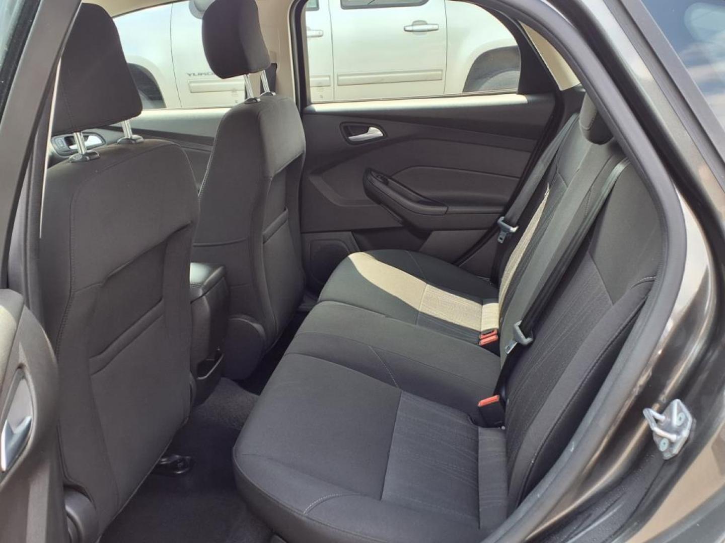 2015 Magnetic Ford Focus SE (1FADP3K26FL) with an 2.0L 4 Cylinder Fuel Injected engine, 4CYL AT transmission, located at 50 Eastern Blvd., Essex, MD, 21221, (410) 686-3444, 39.304367, -76.484947 - Photo#12