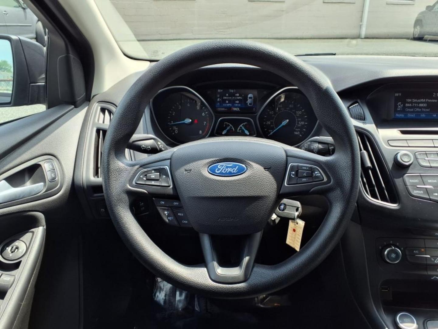 2015 Magnetic Ford Focus SE (1FADP3K26FL) with an 2.0L 4 Cylinder Fuel Injected engine, 4CYL AT transmission, located at 50 Eastern Blvd., Essex, MD, 21221, (410) 686-3444, 39.304367, -76.484947 - Photo#13