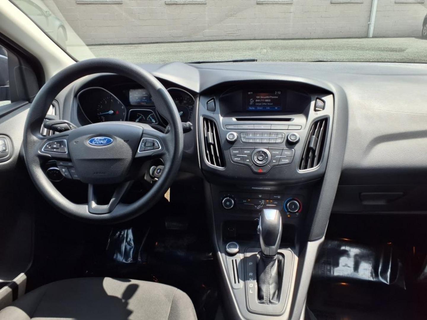 2015 Magnetic Ford Focus SE (1FADP3K26FL) with an 2.0L 4 Cylinder Fuel Injected engine, 4CYL AT transmission, located at 50 Eastern Blvd., Essex, MD, 21221, (410) 686-3444, 39.304367, -76.484947 - Photo#14